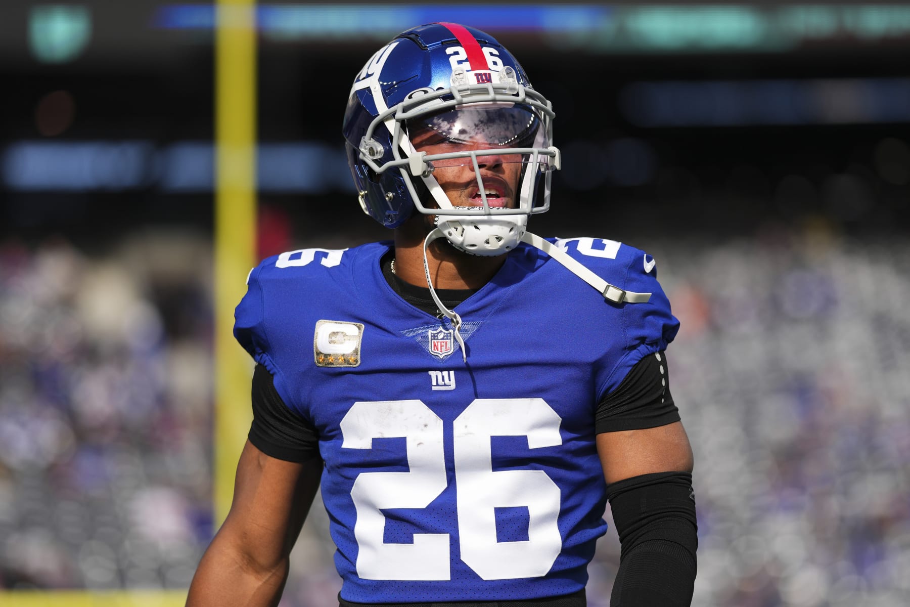 EAST RUTHERFORD, NJ - NOVEMBER 13: Saquon Barkley #26 of the New York Giants looks down field against the Houston Texans at MetLife Stadium on November 13, 2022 in East Rutherford, New Jersey. (Photo by Cooper Neill/Getty Images) EAST RUTHERFORD, NJ - NOVEMBER 13: Saquon Barkley #26 of the New York Giants looks down field against the Houston Texans at MetLife Stadium on November 13, 2022 in East Rutherford, New Jersey. (Photo by Cooper Neill/Getty Images)
