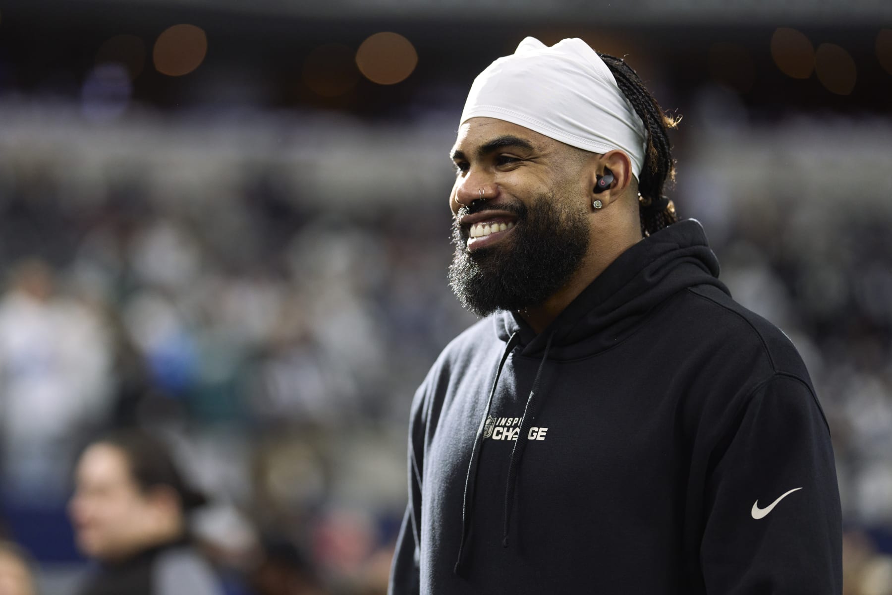 ARLINGTON, TX - DECEMBER 24: Running back Ezekiel Elliott #21 of the Dallas Cowboys warms up before kickoff against the Philadelphia Eagles at AT&T Stadium on December 24, 2022 in Arlington, Texas. (Photo by Cooper Neill/Getty Images)