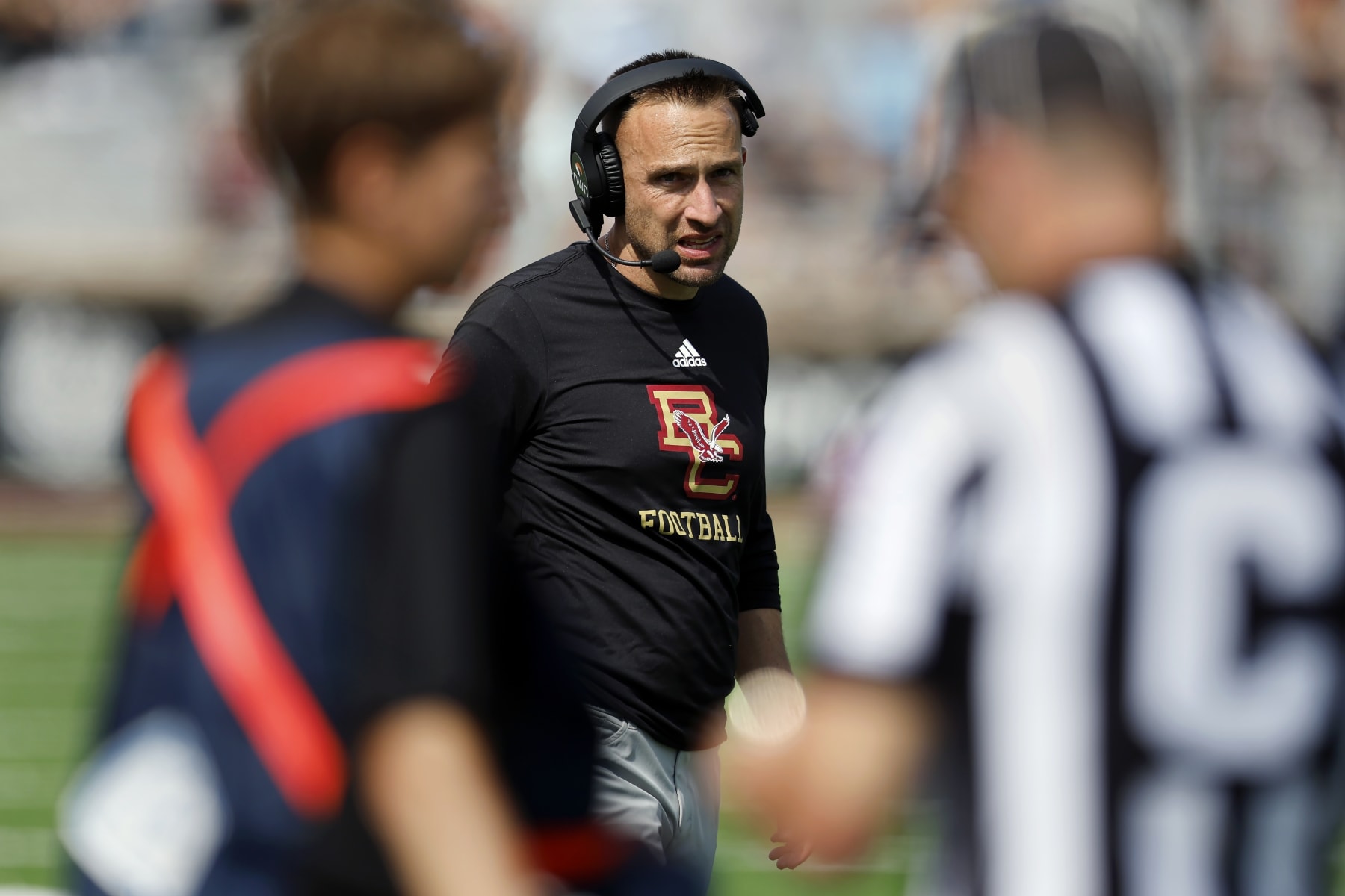 Boston College head coach Jeff Hafley walks on the field during a timeout in the second half of an NCAA college football game against Northern Illinois, Saturday, Sept. 2, 2023, in Boston. (AP Photo/Michael Dwyer)