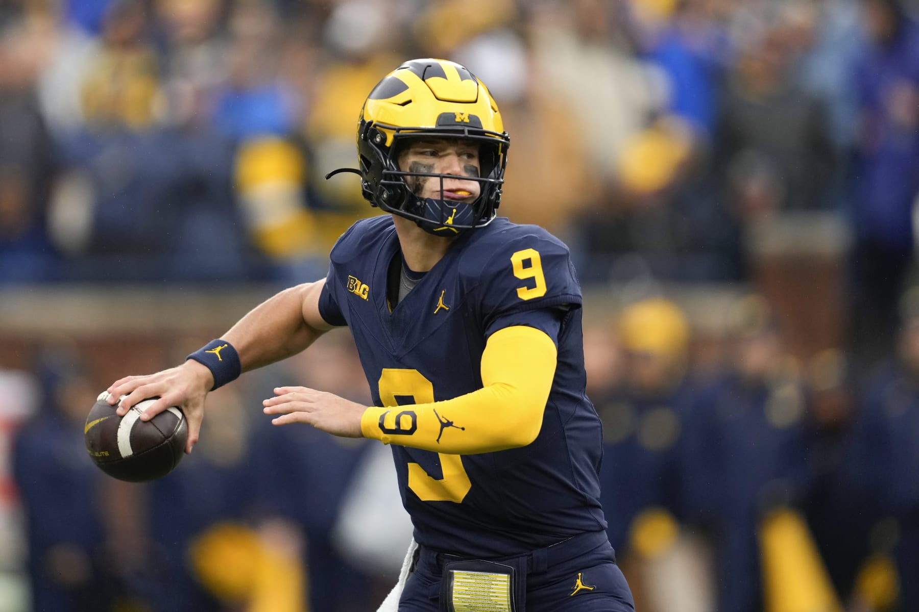 Michigan quarterback J.J. McCarthy (9) throws against Indiana in the first half of an NCAA college football game in Ann Arbor, Mich., Saturday, Oct. 14, 2023. (AP Photo/Paul Sancya)