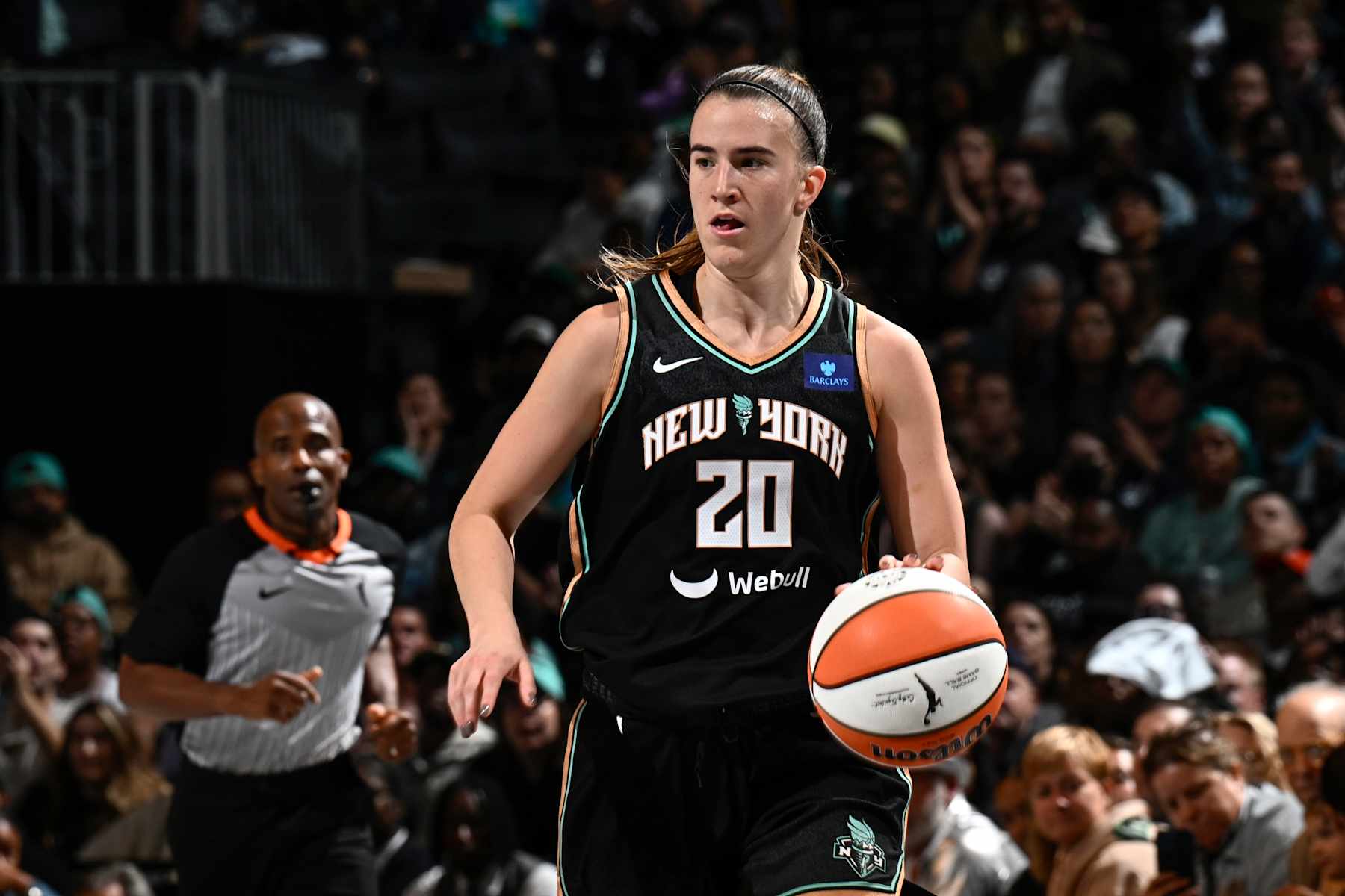 BROOKLYN, NY - SEPTEMBER 29: Sabrina Ionescu #20 of the New York Liberty dribbles the ball during the game against the Las Vegas Aces during Round Two Game One of the 2024 WNBA Playoffs on September 29, 2024 in Brooklyn, New York. NOTE TO USER: User expressly acknowledges and agrees that, by downloading and or using this photograph, user is consenting to the terms and conditions of the Getty Images License Agreement. Mandatory Copyright Notice: Copyright 2024 NBAE (Photo by David Dow/NBAE via Getty Images)