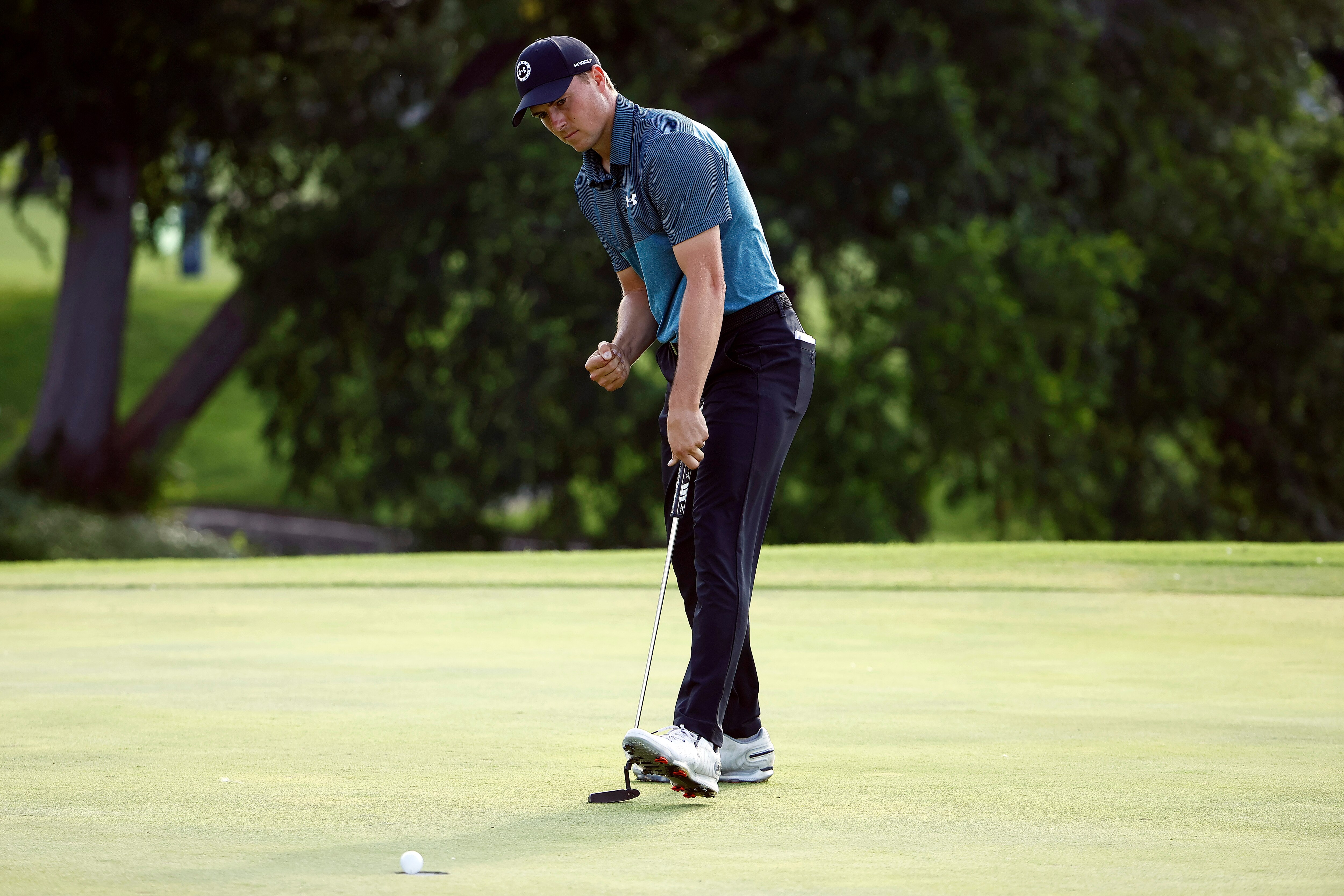 FORT WORTH, TEXAS - MAY 29: Jordan Spieth reacts as he makes a birdie putt on the 18th hole during the third round of the Charles Schwab Challenge at Colonial Country Club on May 29, 2021 in Fort Worth, Texas. (Photo by Tom Pennington/Getty Images)