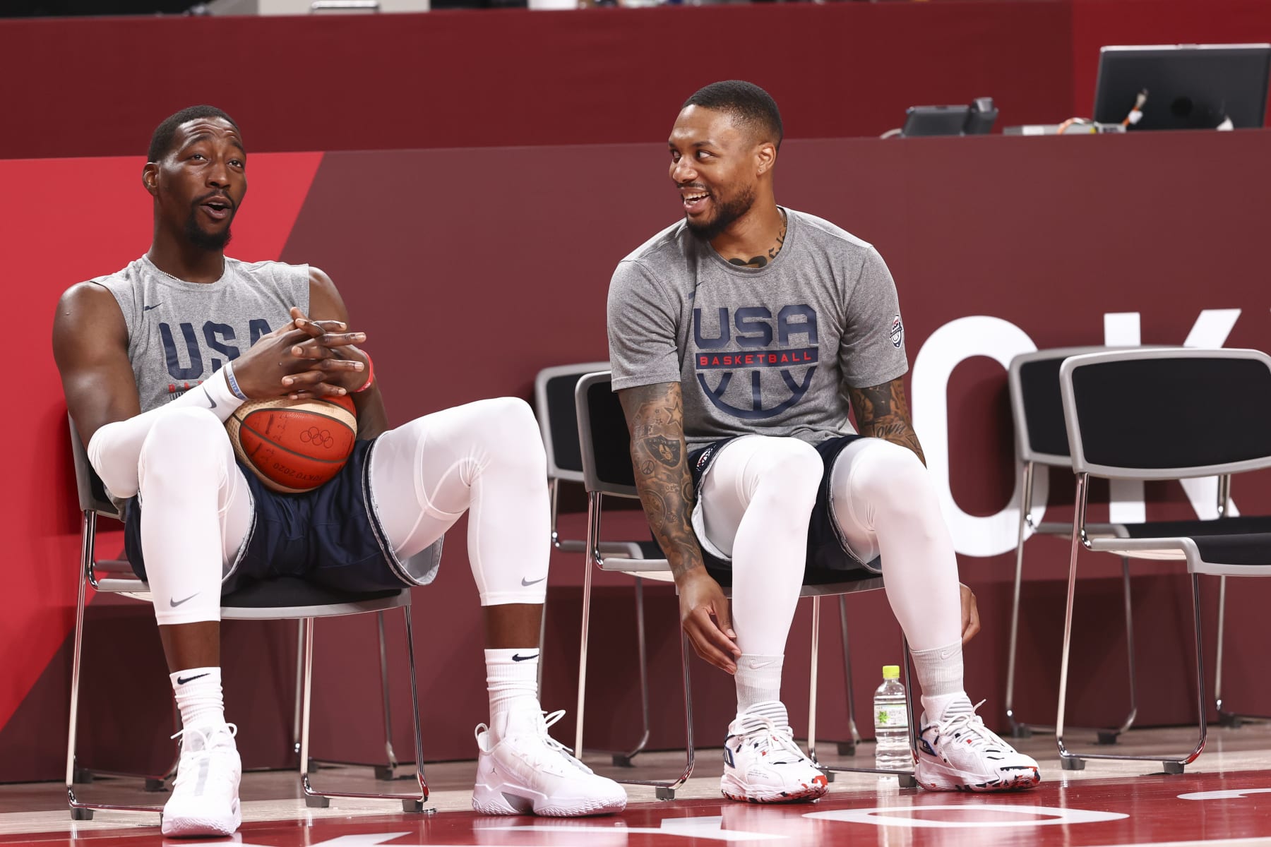 TOKYO, JAPAN - AUGUST 7: Bam Adebayo #13 of the USA Men's National Team talks to Damian Lillard #6 of the USA Men's National Team before the Gold Medal Game of the 2020 Tokyo Olympics at the Saitama Super Arena on August 7, 2021 in Tokyo, Japan. NOTE TO USER: User expressly acknowledges and agrees that, by downloading and/or using this Photograph, user is consenting to the terms and conditions of the Getty Images License Agreement. Mandatory Copyright Notice: Copyright 2021 NBAE (Photo by Ned Dishman/NBAE via Getty Images)