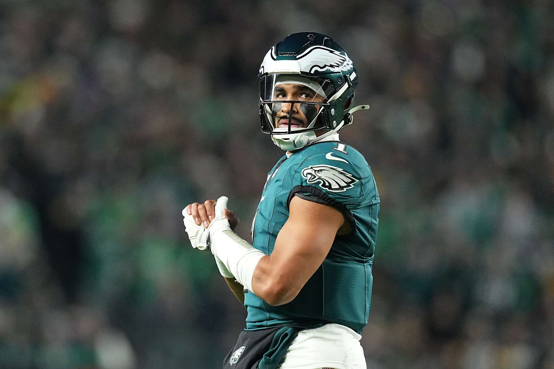 PHILADELPHIA, PENNSYLVANIA - DECEMBER 15: Jalen Hurts #1 of the Philadelphia Eagles looks on during the second quarter against the Pittsburgh Steelers at Lincoln Financial Field on December 15, 2024 in Philadelphia, Pennsylvania. (Photo by Mitchell Leff/Getty Images)