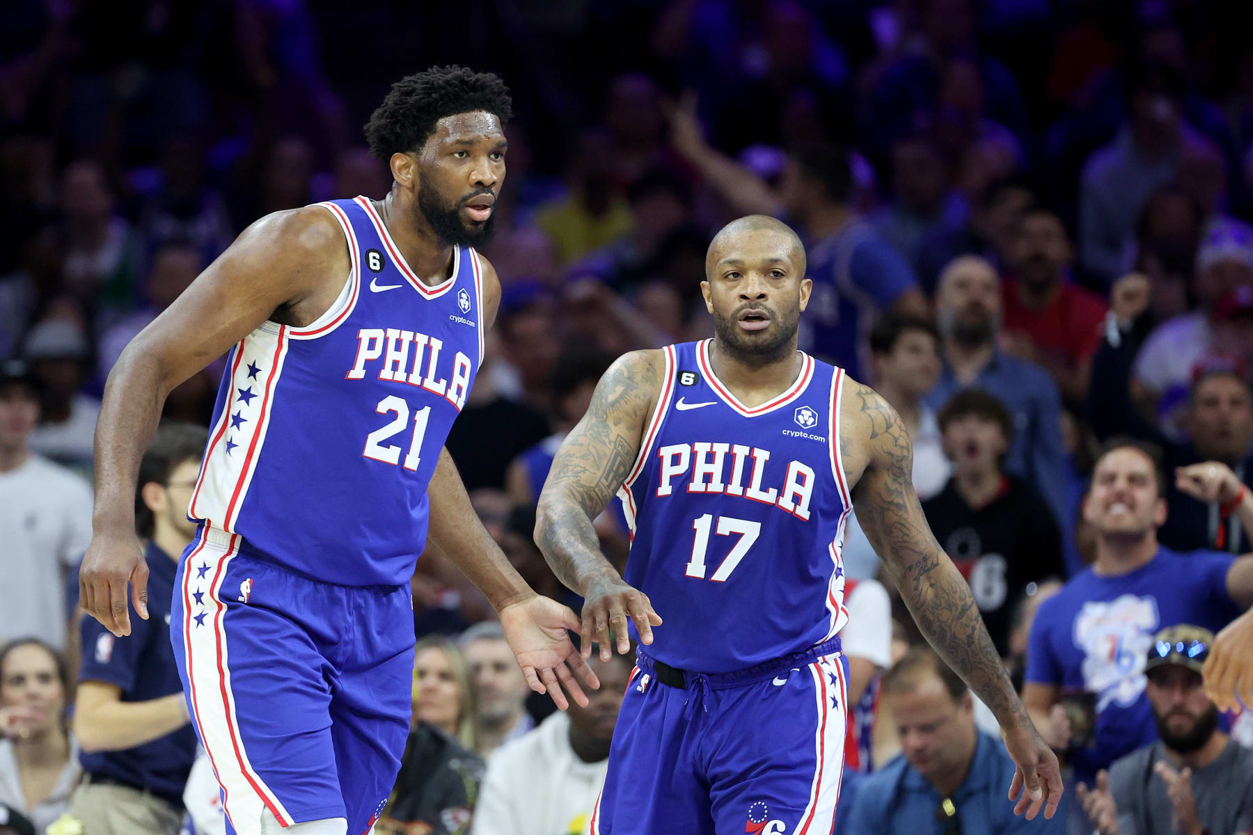 PHILADELPHIA, PENNSYLVANIA - MAY 07: Joel Embiid #21 and P.J. Tucker #17 of the Philadelphia 76ers high five against the Boston Celtics during the first quarter in game four of the Eastern Conference Second Round Playoffs at Wells Fargo Center on May 07, 2023 in Philadelphia, Pennsylvania. NOTE TO USER: User expressly acknowledges and agrees that, by downloading and or using this photograph, User is consenting to the terms and conditions of the Getty Images License Agreement. (Photo by Tim Nwachukwu/Getty Images)
