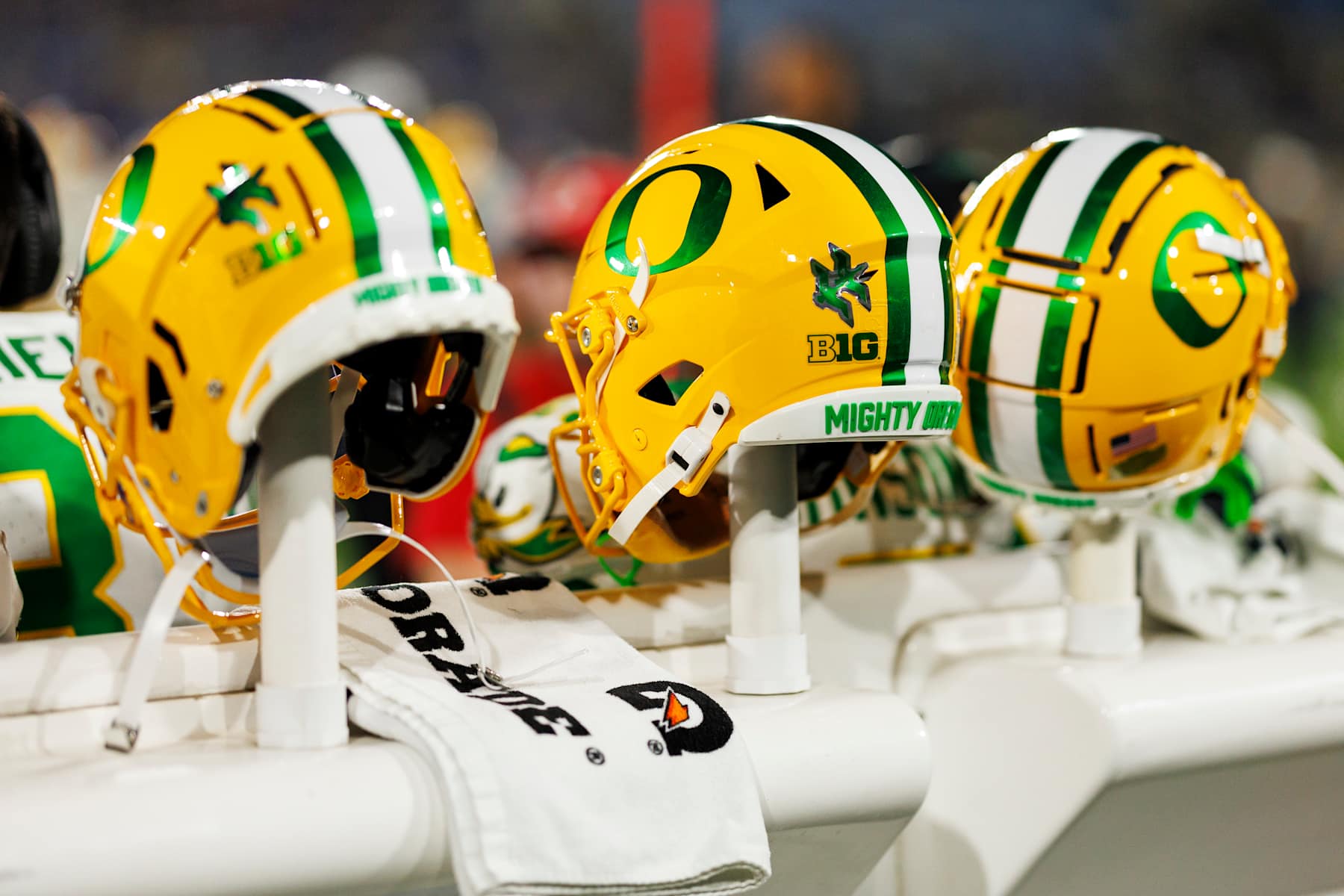 PASADENA, CA - SEPTEMBER 28: A detail view of an Oregon Ducks helmet on the sidelines during the first quarter of an NCAA college football game against the UCLA Bruins, at Rose Bowl on September 28, 2024 in Pasadena, California. (Photo by Brooke Sutton/Getty Images)