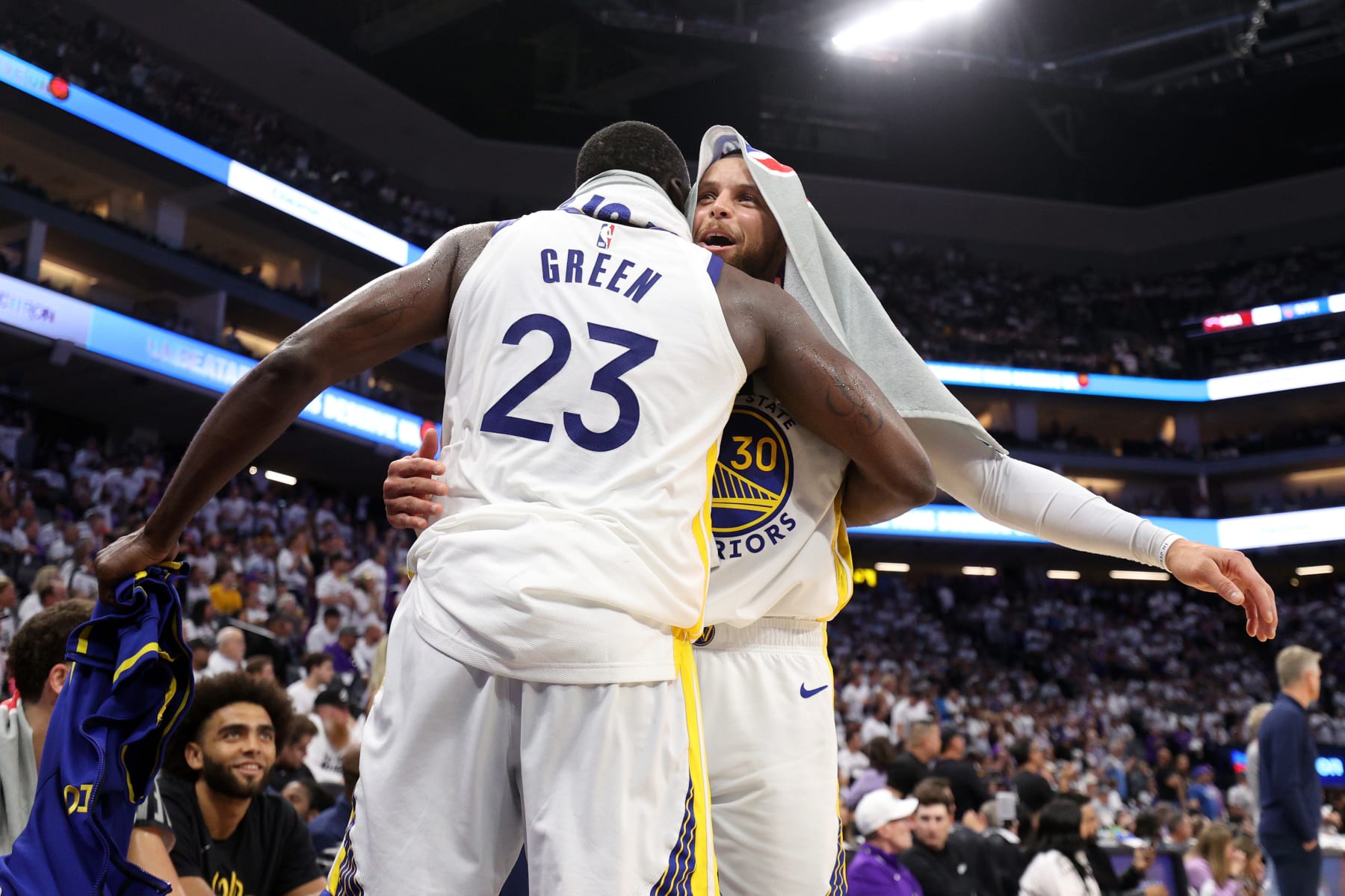 SACRAMENTO, CALIFORNIA - APRIL 30: Stephen Curry #30 of the Golden State Warriors reacts with Draymond Green #23 during the fourth quarter in game seven of the Western Conference First Round Playoffs against the Sacramento Kings at Golden 1 Center on April 30, 2023 in Sacramento, California. NOTE TO USER: User expressly acknowledges and agrees that, by downloading and or using this photograph, User is consenting to the terms and conditions of the Getty Images License Agreement. (Photo by Ezra Shaw/Getty Images)