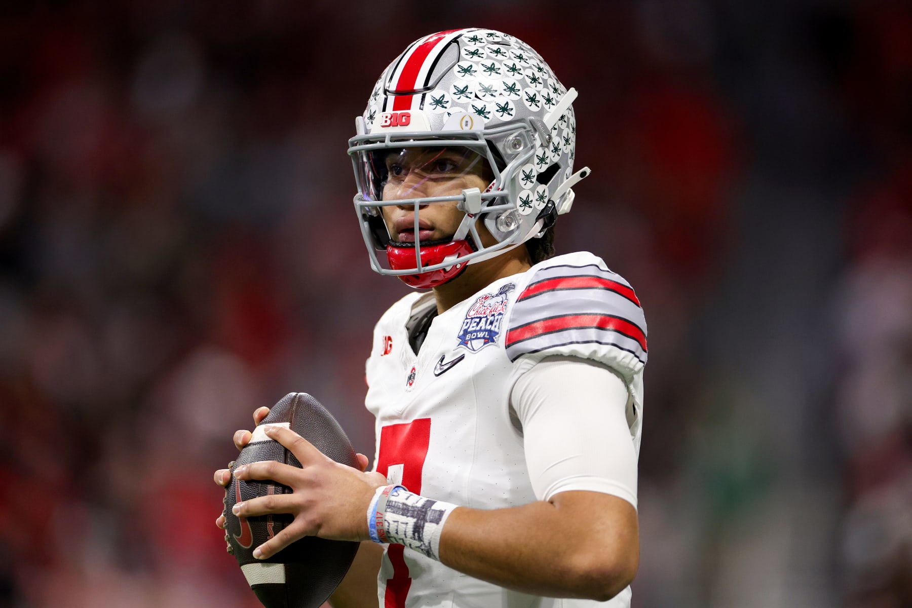 ATLANTA, GEORGIA - DECEMBER 31: C.J. Stroud #7 of the Ohio State Buckeyes warms up prior to the game against the Georgia Bulldogs in the Chick-fil-A Peach Bowl at Mercedes-Benz Stadium on December 31, 2022 in Atlanta, Georgia. (Photo by Carmen Mandato/Getty Images) ATLANTA, GEORGIA - DECEMBER 31: C.J. Stroud #7 of the Ohio State Buckeyes warms up prior to the game against the Georgia Bulldogs in the Chick-fil-A Peach Bowl at Mercedes-Benz Stadium on December 31, 2022 in Atlanta, Georgia. (Photo by Carmen Mandato/Getty Images)