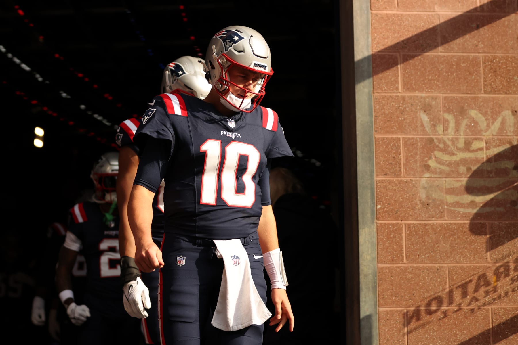 FOXBOROUGH, MASSACHUSETTS - NOVEMBER 05: Mac Jones #10 of the New England Patriots takes the field before the game against the Washington Commanders at Gillette Stadium on November 05, 2023 in Foxborough, Massachusetts. (Photo by Adam Glanzman/Getty Images)