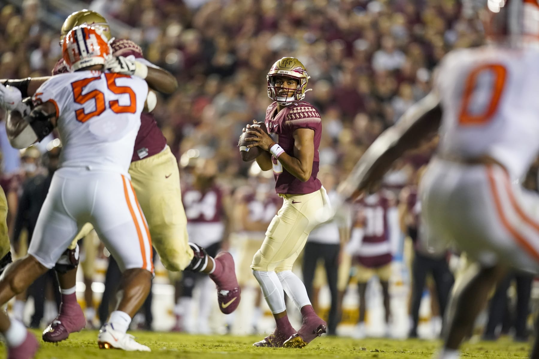 TALLAHASSEE, FL - OCTOBER 15: Florida State Seminoles quarterback Jordan Travis (13) looks to pass during the Clemson Tigers game against the Florida State Seminoles on October 15, 2022, at Doak Campbell Stadium in Tallahassee, FL. (Photo by Chris Leduc/Icon Sportswire via Getty Images)