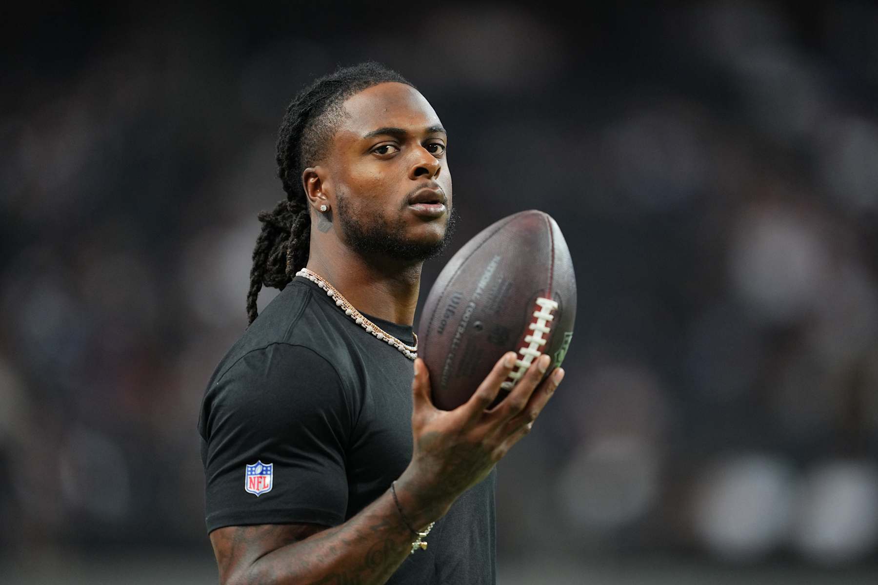 LAS VEGAS, NEVADA - AUGUST 17:  Wide receiver Davante Adams #17 of the Las Vegas Raiders looks on before a preseason game against the Dallas Cowboys at Allegiant Stadium on August 17, 2024 in Las Vegas, Nevada.  (Photo by Chris Unger/Getty Images)