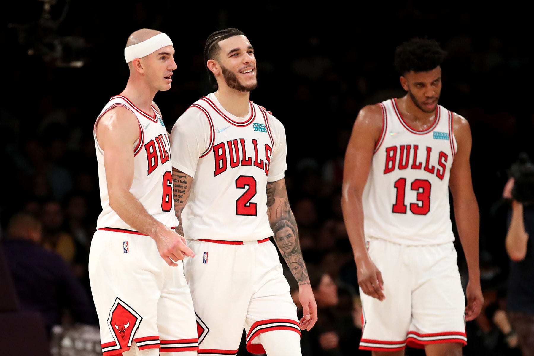 LOS ANGELES, CALIFORNIA - NOVEMBER 15: Alex Caruso #6 and Lonzo Ball #2 of the Chicago Bulls react to a play during the fourth quarter against the Los Angeles Lakers at Staples Center on November 15, 2021 in Los Angeles, California. NOTE TO USER: User expressly acknowledges and agrees that, by downloading and or using this photograph, User is consenting to the terms and conditions of the Getty Images License Agreement. (Photo by Katelyn Mulcahy/Getty Images)