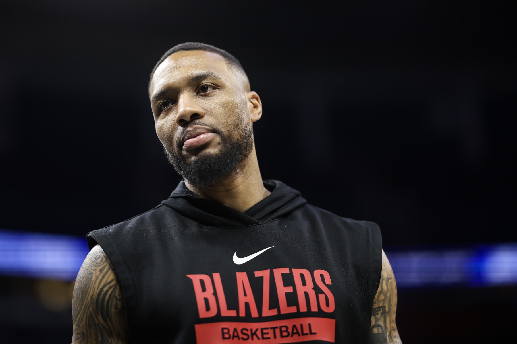 ORLANDO, FLORIDA - MARCH 05: Damian Lillard #0 of the Portland Trail Blazers looks on before the start of a game against the Orlando Magic at the Amway Center on March 05, 2023 in Orlando, Florida. NOTE TO USER: User expressly acknowledges and agrees that, by downloading and or using this photograph, User is consenting to the terms and conditions of the Getty Images License Agreement. (Photo by James Gilbert/Getty Images)