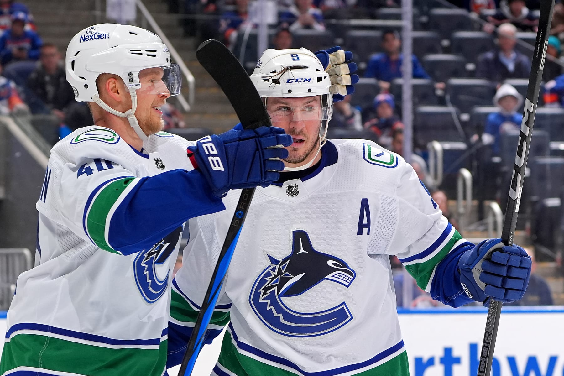 Elias Pettersson and J.T. Miller.