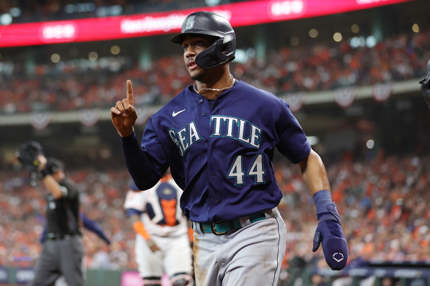 HOUSTON, TEXAS - OCTOBER 11: Julio Rodriguez #44 of the Seattle Mariners reacts after scoring a run against the Houston Astros during the first inning in game one of the American League Division Series at Minute Maid Park on October 11, 2022 in Houston, Texas. (Photo by Carmen Mandato/Getty Images)