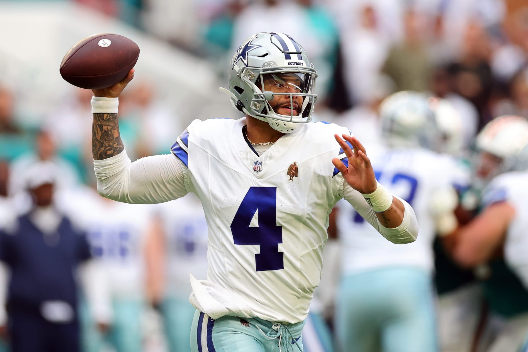 MIAMI GARDENS, FLORIDA - DECEMBER 24: Dak Prescott #4 of the Dallas Cowboys looks to pass during a game against the Miami Dolphins at Hard Rock Stadium on December 24, 2023 in Miami Gardens, Florida.  The Dolphins defeated the Cowboys 22-20. (Photo by Stacy Revere/Getty Images)