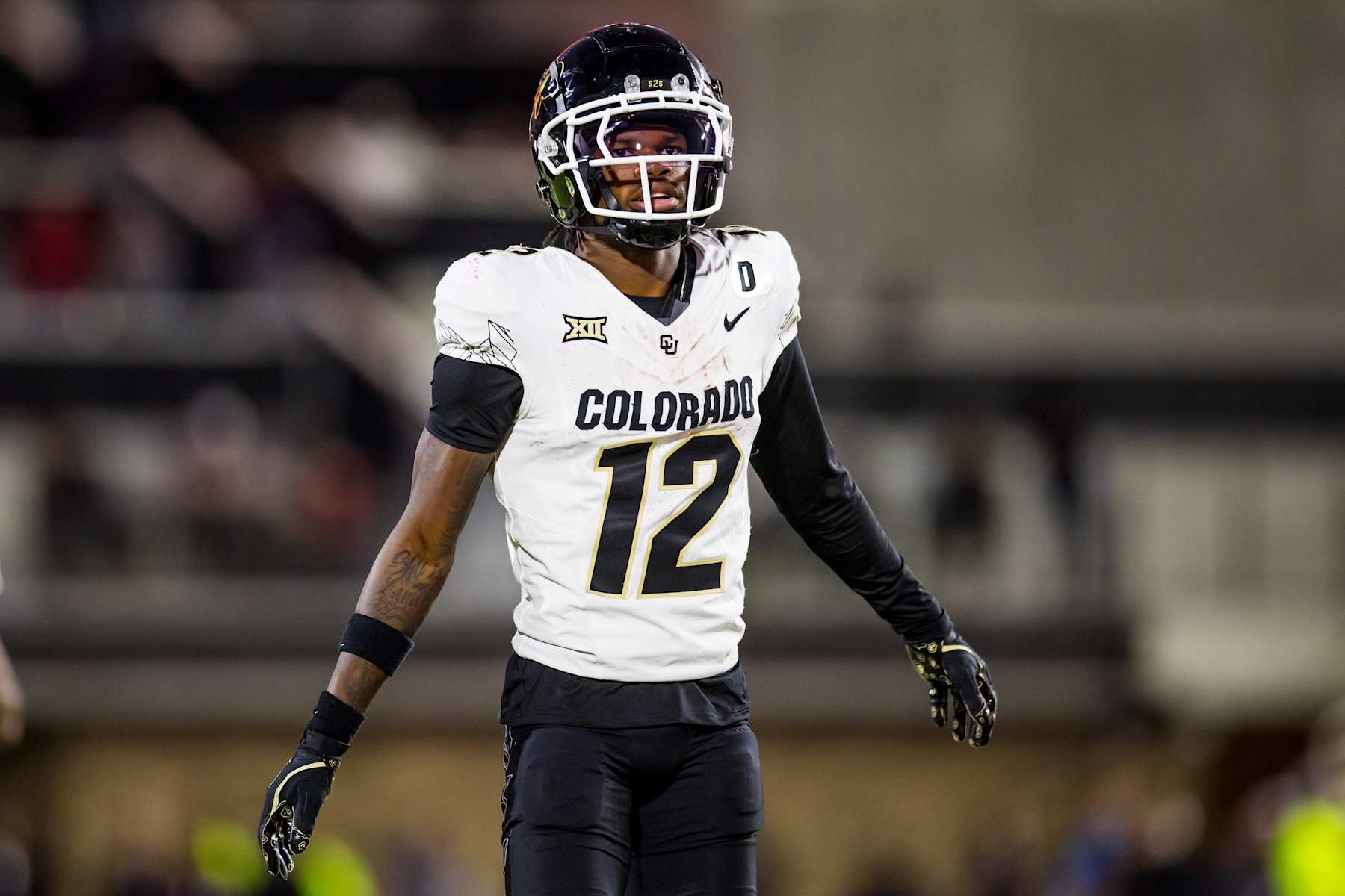 LUBBOCK, TEXAS - NOVEMBER 09: Travis Hunter #12 of the Colorado Buffaloes stands on the field during the second half of the game against the Texas Tech Red Raiders at Jones AT&T Stadium on November 09, 2024 in Lubbock, Texas. (Photo by John E. Moore III/Getty Images)