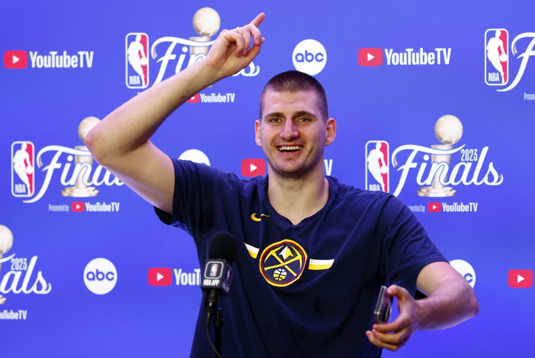 DENVER, COLORADO - JUNE 12: Nikola Jokic #15 of the Denver Nuggets speaks with media after a 94-89 victory against the Miami Heat in Game Five of the 2023 NBA Finals to win the NBA Championship at Ball Arena on June 12, 2023 in Denver, Colorado. NOTE TO USER: User expressly acknowledges and agrees that, by downloading and or using this photograph, User is consenting to the terms and conditions of the Getty Images License Agreement. (Photo by Justin Edmonds/Getty Images)