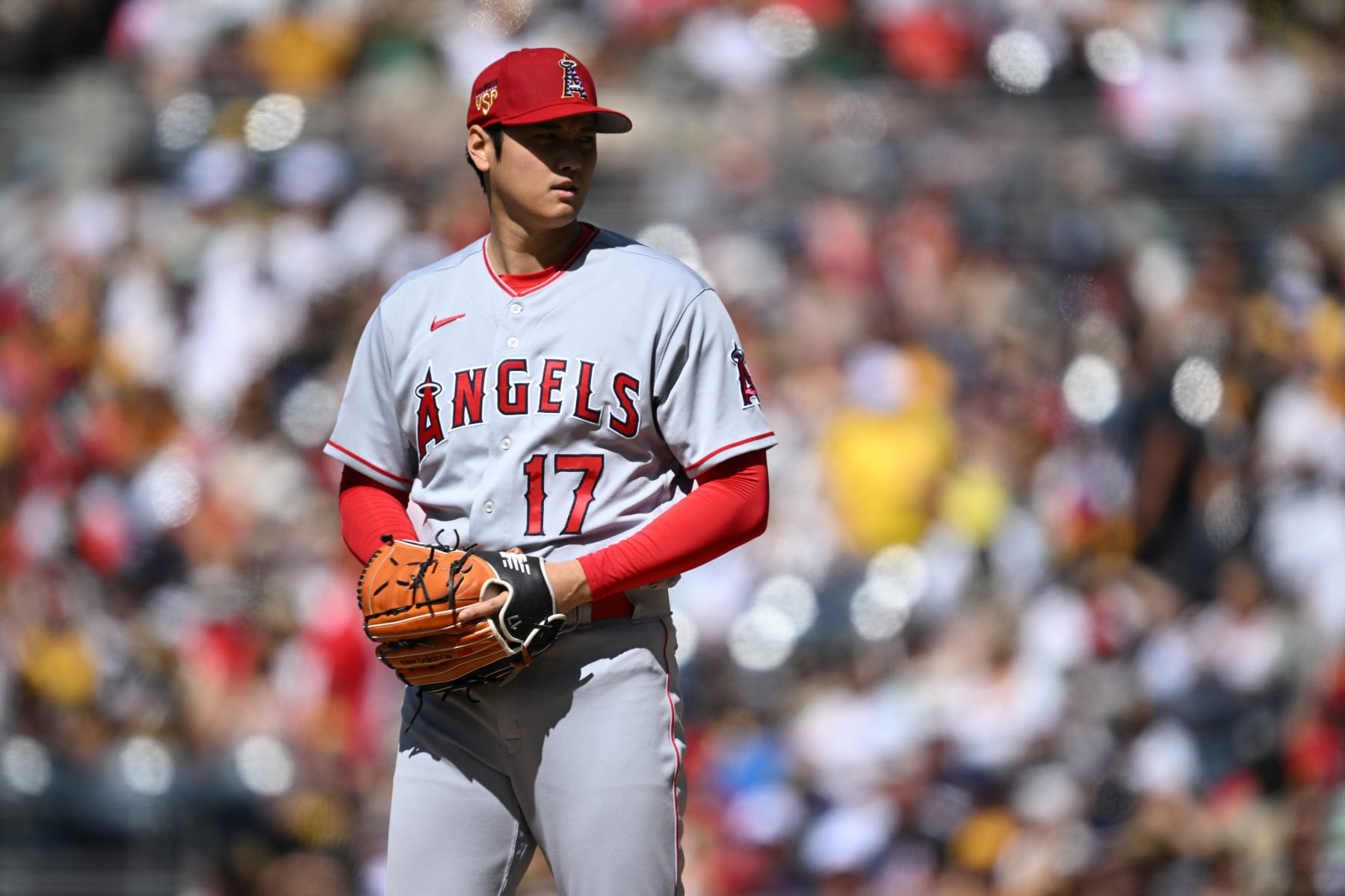 SAN DIEGO, CALIFORNIA - JULY 04: Shohei Ohtani #17 of the Los Angeles Angels throws a pitch against the San Diego Padres during the first inning at PETCO Park on July 04, 2023 in San Diego, California. (Photo by Orlando Ramirez/Getty Images)
