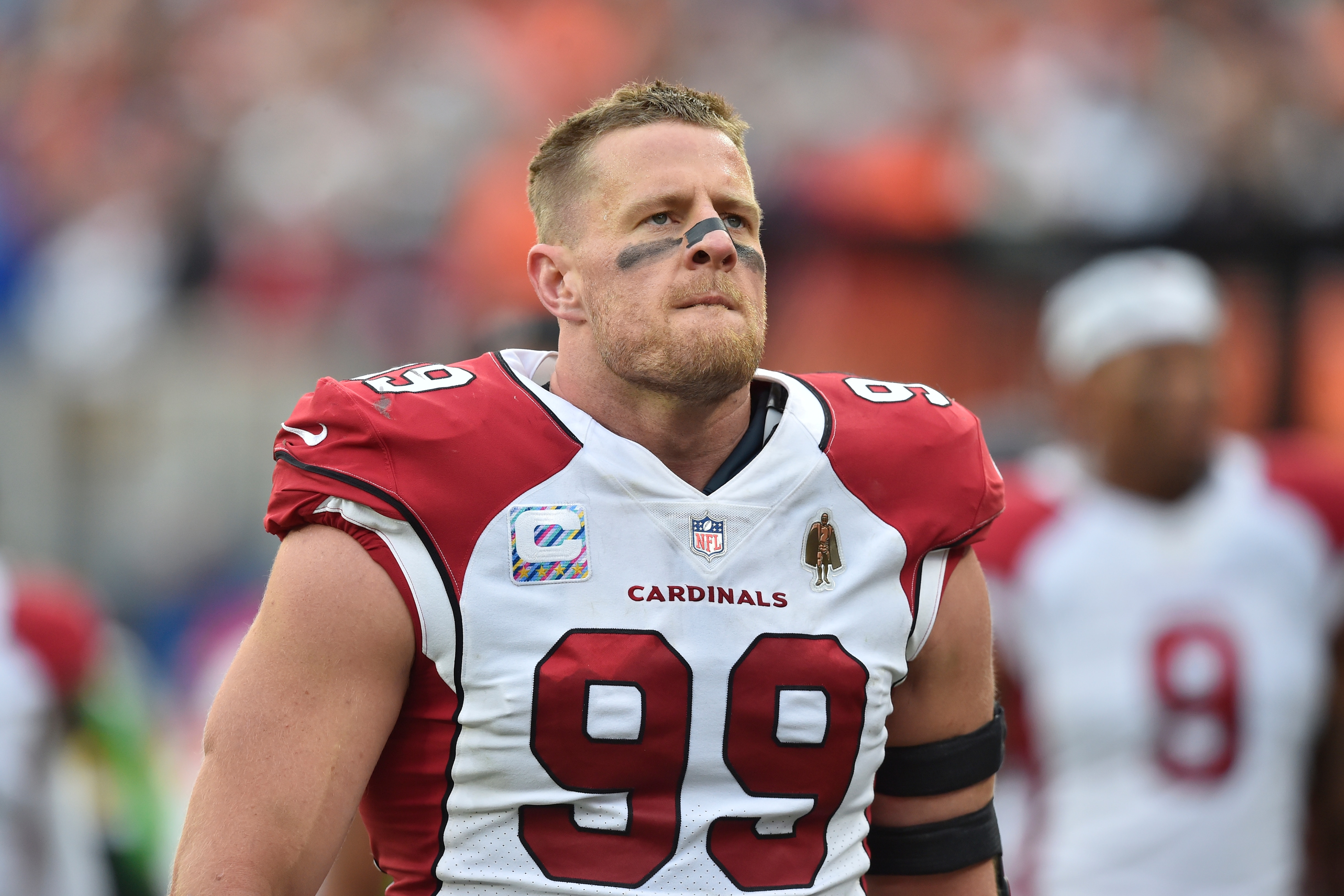 Arizona Cardinals defensive end J.J. Watt walks on the field during an NFL football game against the Cleveland Browns, Sunday, Oct. 17, 2021, in Cleveland. The Cardinals won 37-14. (AP Photo/David Richard)