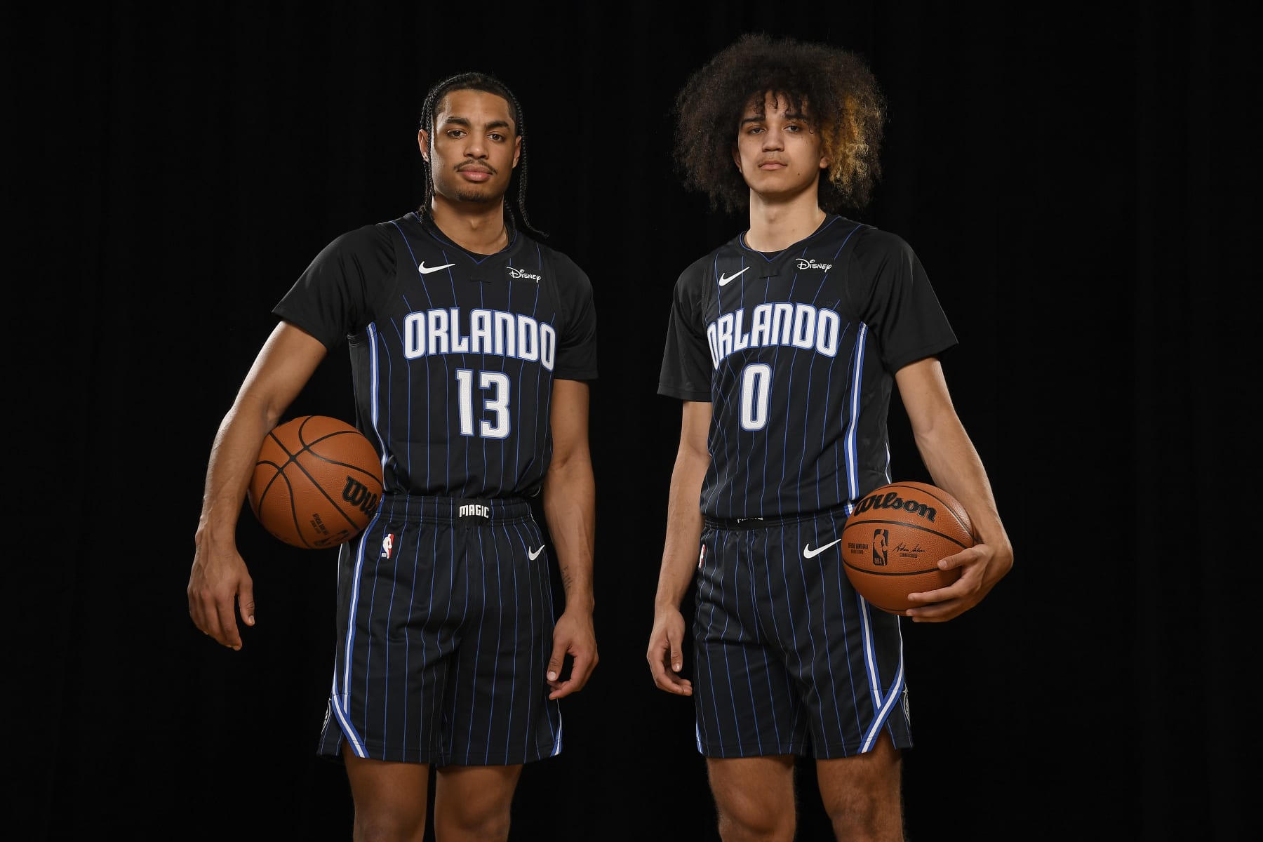 LAS VEGAS, NV - JULY14: Anthony Black #0 and Jett Howard #13 of the Orlando Magic pose for a portrait during the 2023 NBA Rookie Photo Shoot on July 14, 2023 at the University of Nevada, Las Vegas campus in Las Vegas, Nevada. NOTE TO USER: User expressly acknowledges and agrees that, by downloading and/or using this Photograph, user is consenting to the terms and conditions of the Getty Images License Agreement. Mandatory Copyright Notice: Copyright 2023 NBAE (Photo by Brian Babineau/NBAE via Getty Images)