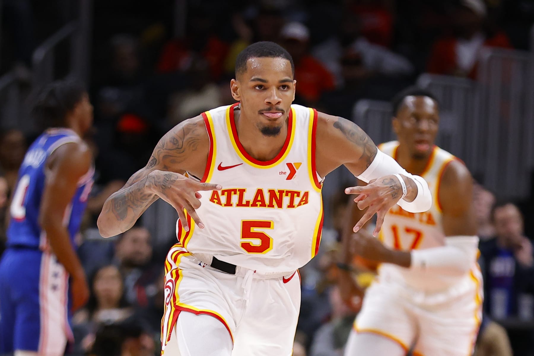 ATLANTA, GEORGIA - JANUARY 10: Dejounte Murray #5 of the Atlanta Hawks reacts during the second quarter against the Philadelphia 76ers at State Farm Arena on January 10, 2024 in Atlanta, Georgia. NOTE TO USER: User expressly acknowledges and agrees that, by downloading and or using this photograph, User is consenting to the terms and conditions of the Getty Images License Agreement. (Photo by Todd Kirkland/Getty Images)