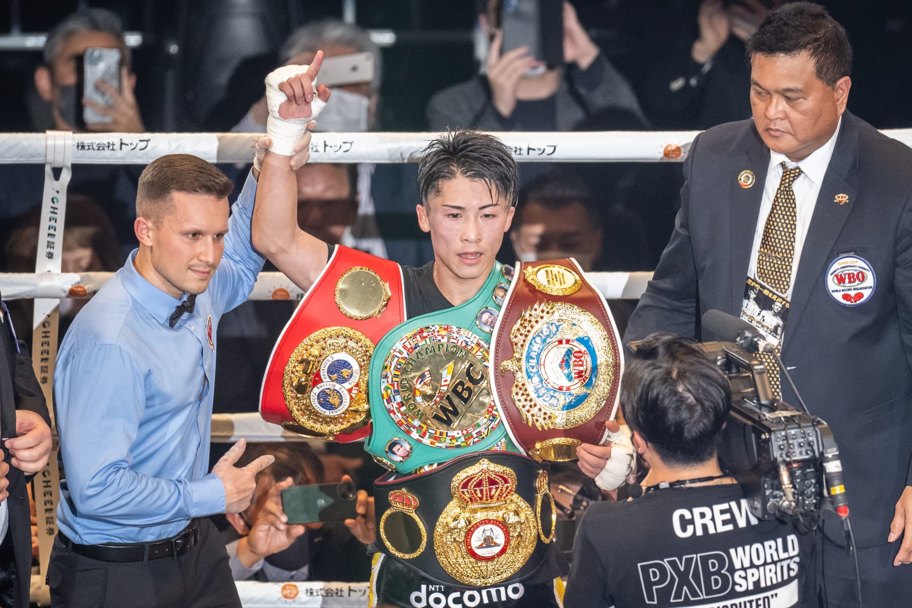 Japans Naoya Inoue celebrates his victory over Britains Paul Butler during their bantamweight title unification boxing bout in Tokyo on December 13, 2022. (Photo by Yuichi YAMAZAKI / AFP) (Photo by YUICHI YAMAZAKI/AFP via Getty Images)