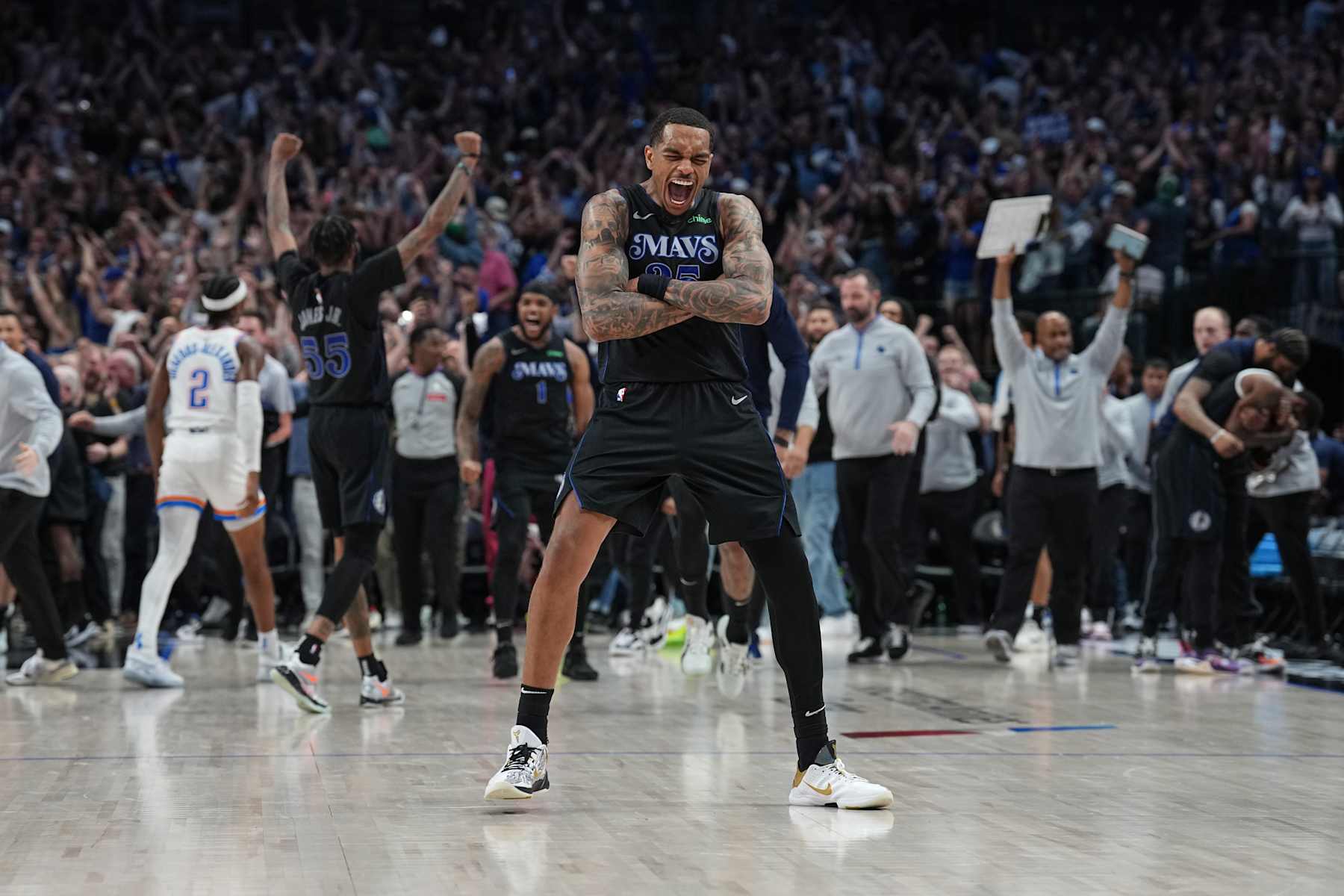 DALLAS, TX - MAY 18:  P.J. Washington #25 of the Dallas Mavericks celebrates after the game against the Oklahoma City Thunder during Round 2 Game 6 of the 2024 NBA Playoffs  on May 18, 2024  at the American Airlines Center in Dallas, Texas. NOTE TO USER: User expressly acknowledges and agrees that, by downloading and or using this photograph, User is consenting to the terms and conditions of the Getty Images License Agreement. Mandatory Copyright Notice: Copyright 2024 NBAE (Photo by Glenn James/NBAE via Getty Images)