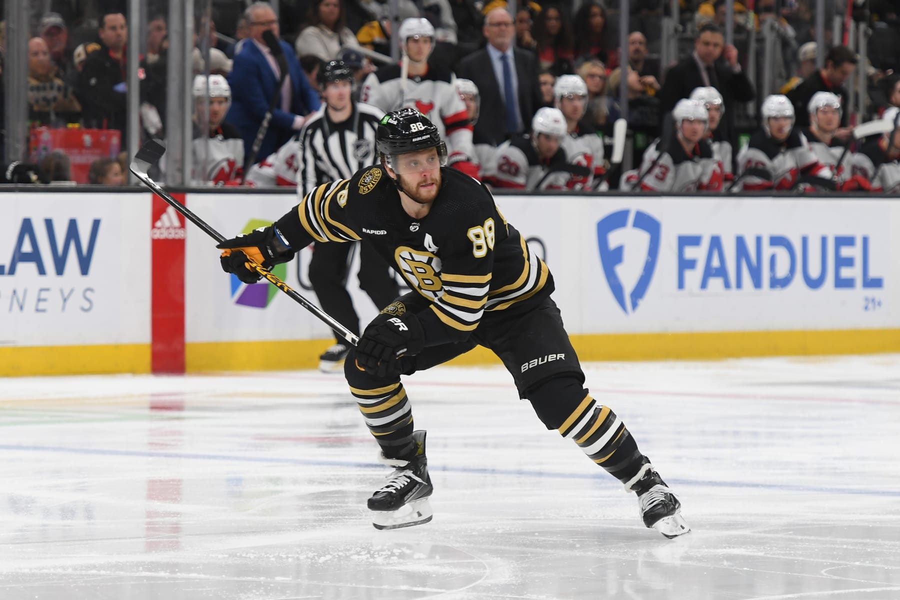 BOSTON, MASSACHUSETTS - JANUARY 15: David Pastrnak #88 of the Boston Bruins skates against the New Jersey Devils at the TD Garden on January 15, 2024 in Boston, Massachusetts. (Photo by Steve Babineau/NHLI via Getty Images)