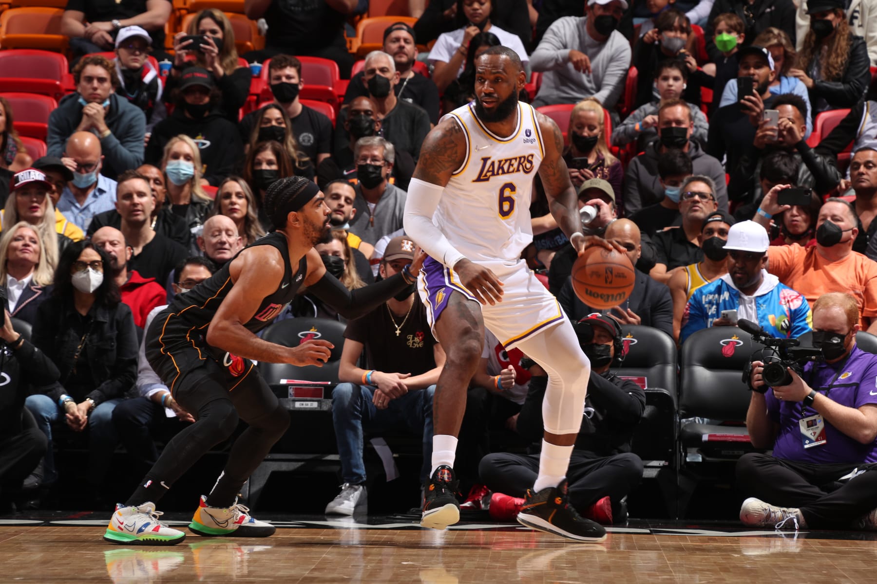 MIAMI, FL - JANUARY 23: Gabe Vincent #2 of the Miami Heat plays defense on LeBron James #6 of the Los Angeles Lakers during the game on January 23, 2022 at FTX Arena in Miami, Florida. NOTE TO USER: User expressly acknowledges and agrees that, by downloading and or using this Photograph, user is consenting to the terms and conditions of the Getty Images License Agreement. Mandatory Copyright Notice: Copyright 2022 NBAE (Photo by Issac Baldizon/NBAE via Getty Images)