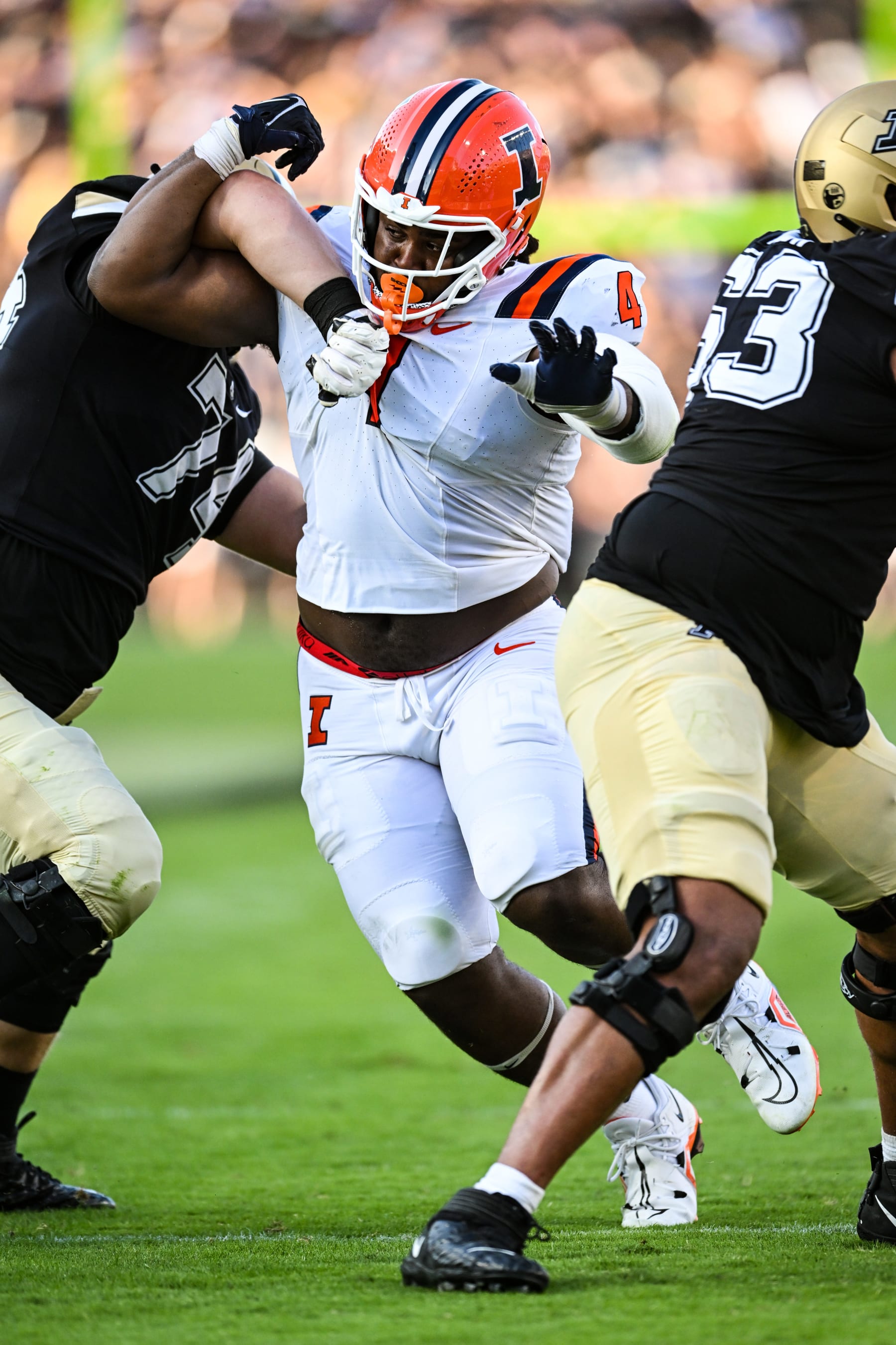 WEST LAFAYETTE, IN - SEPTEMBER 30: Illinois DT Jer'Zhan Newton (4) is blocked during a college football game between the Illinois Fighting Illini and Purdue Boilermakers on September 30, 2023 at Ross-Ade Stadium in West Lafayette, IN.  (Photo by James Black/Icon Sportswire via Getty Images)