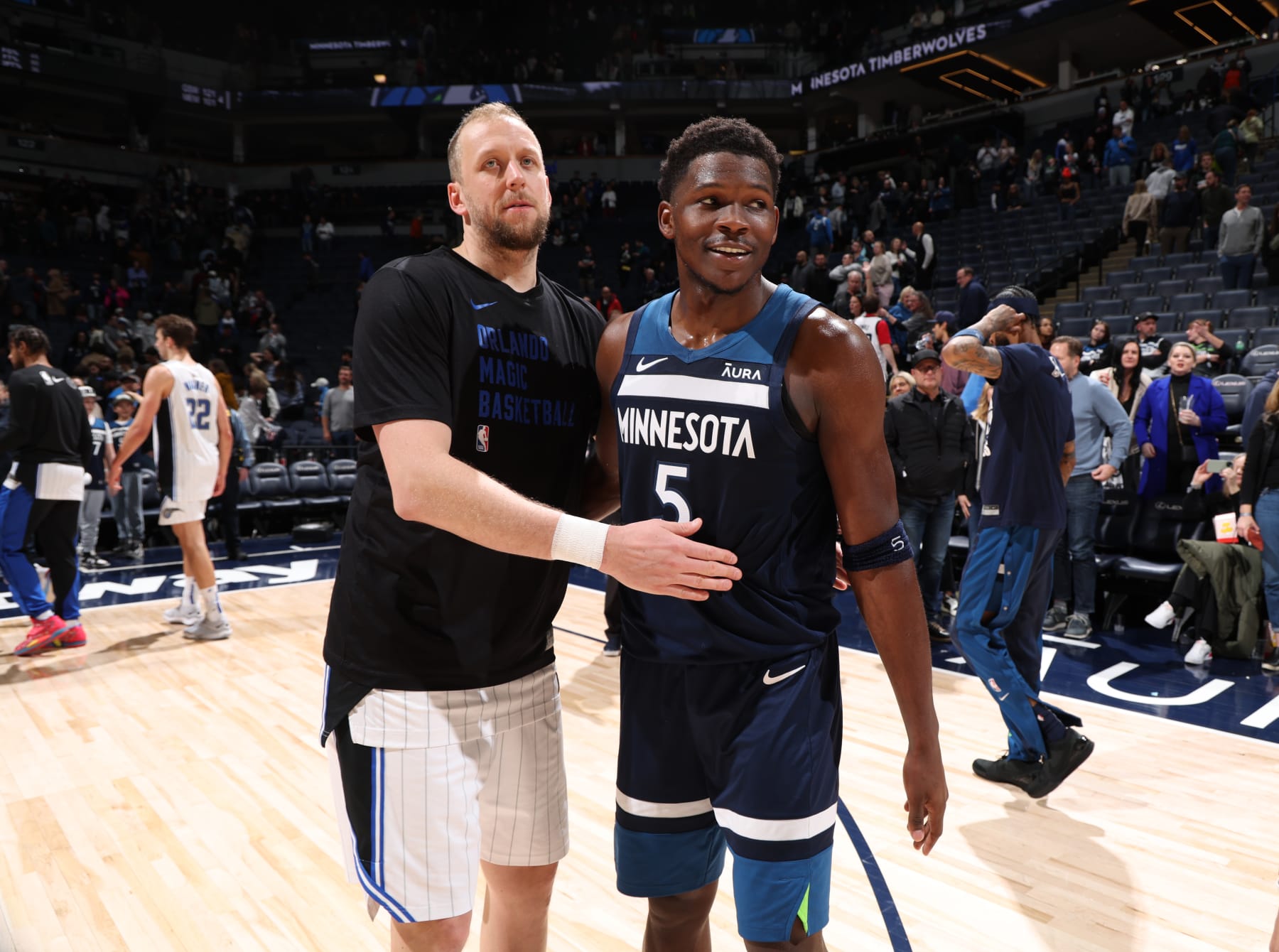 MINNEAPOLIS, MN -  FEBRUARY 2: Joe Ingles #7 of the Orlando Magic embraces Anthony Edwards #5 of the Minnesota Timberwolves after the game on February 2, 2024 at Target Center in Minneapolis, Minnesota. NOTE TO USER: User expressly acknowledges and agrees that, by downloading and or using this Photograph, user is consenting to the terms and conditions of the Getty Images License Agreement. Mandatory Copyright Notice: Copyright 2024 NBAE (Photo by David Sherman/NBAE via Getty Images)