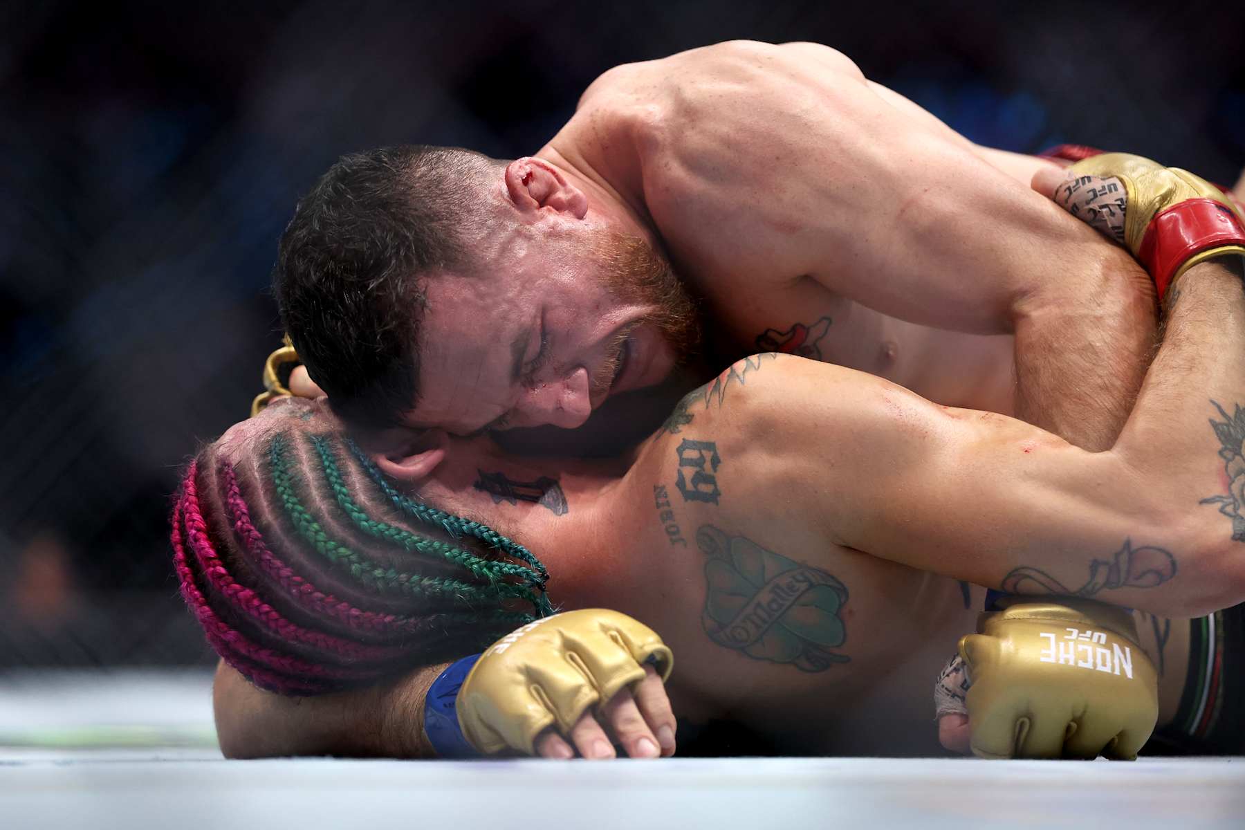 LAS VEGAS, NEVADA - SEPTEMBER 14: (L-R) Sean O’Malley of the United States fights Merab Dvalishvili of Georgia for the bantamweight title during UFC 306: Riyadh Season Noche at Sphere on September 14, 2024 in Las Vegas, Nevada. (Photo by Christian Petersen/Getty Images)