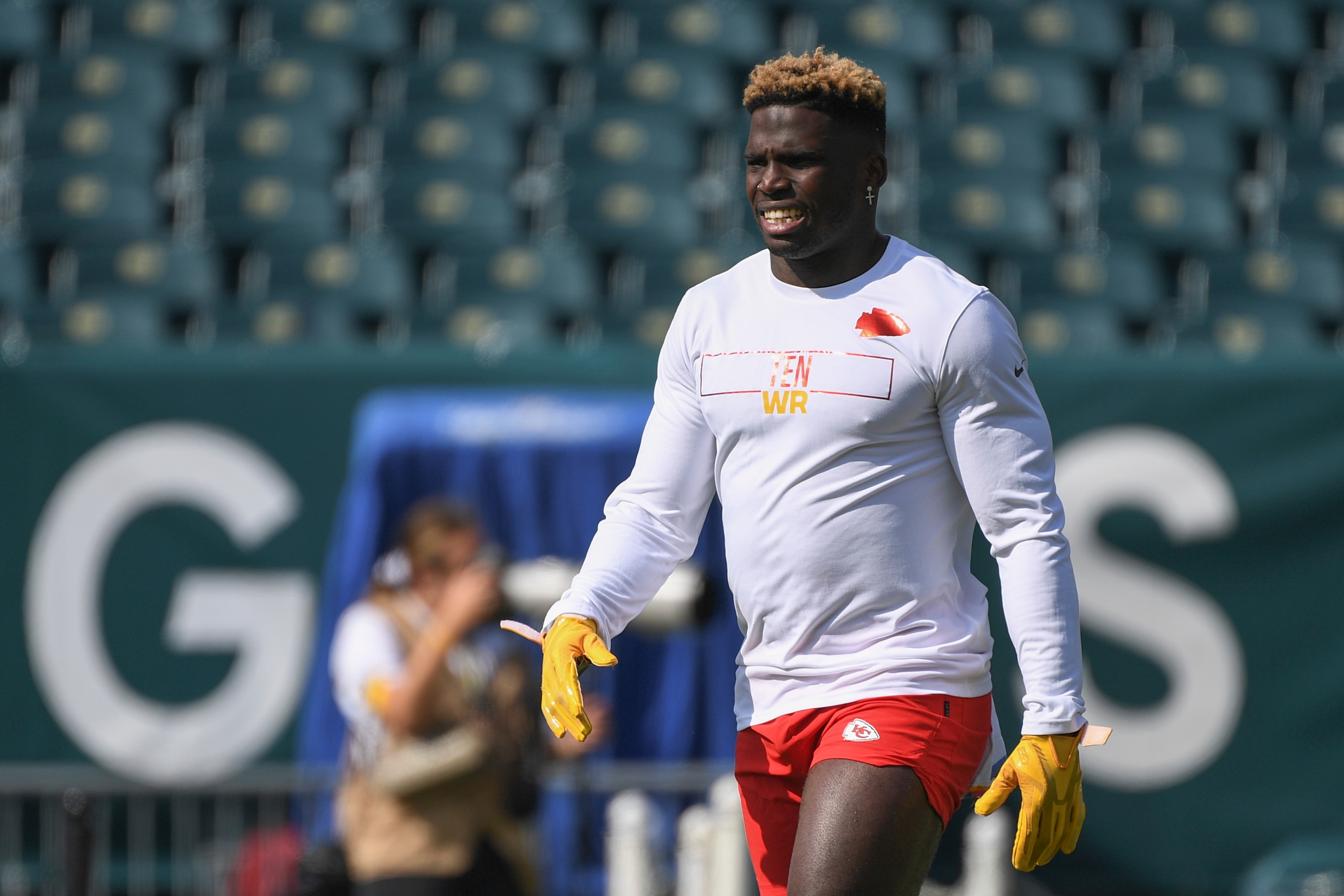 Kansas City Chiefs wide receiver Tyreek Hill walks on the field during pre-game warm-ups before an NFL football game against the Philadelphia Eagles, Sunday, Oct. 3, 2021, in Philadelphia. (AP Photo/Terrance Williams)