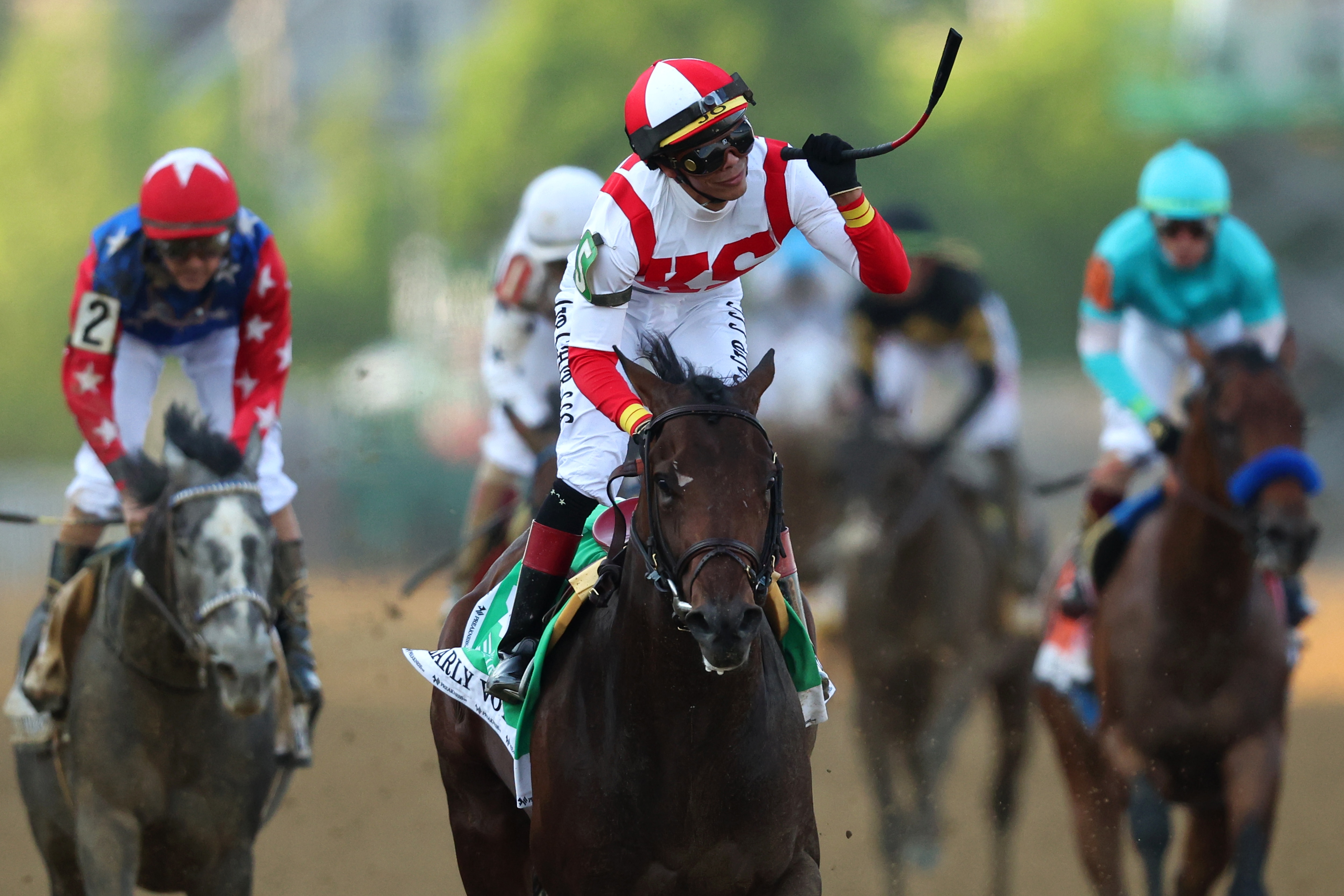 BALTIMORE, MARYLAND - MAY 21: Jockey Jose Ortiz #5 riding Early Voting celebrates after winning the 147th Running of the Preakness Stakes at Pimlico Race Course on May 21, 2022 in Baltimore, Maryland. (Photo by Patrick Smith/Getty Images)