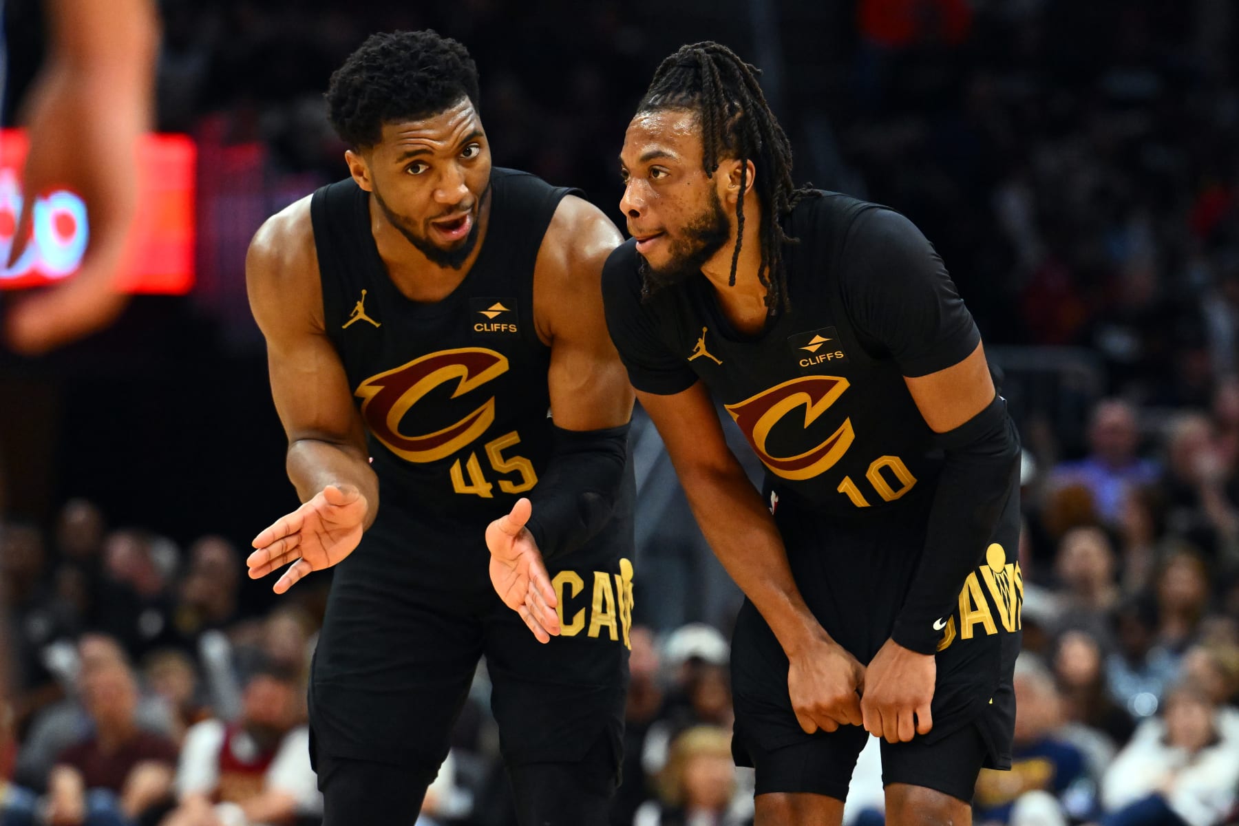 CLEVELAND, OHIO - MAY 05: Donovan Mitchell #45 talks with Darius Garland #10 of the Cleveland Cavaliers during the fourth quarter of Game Seven of the Eastern Conference First Round Playoffs against the Orlando Magic at Rocket Mortgage Fieldhouse on May 05, 2024 in Cleveland, Ohio. The Cavaliers defeated the Magic 106-94. NOTE TO USER: User expressly acknowledges and agrees that, by downloading and/or using this Photograph, user is consenting to the terms and conditions of the Getty Images License Agreement. (Photo by Jason Miller/Getty Images)