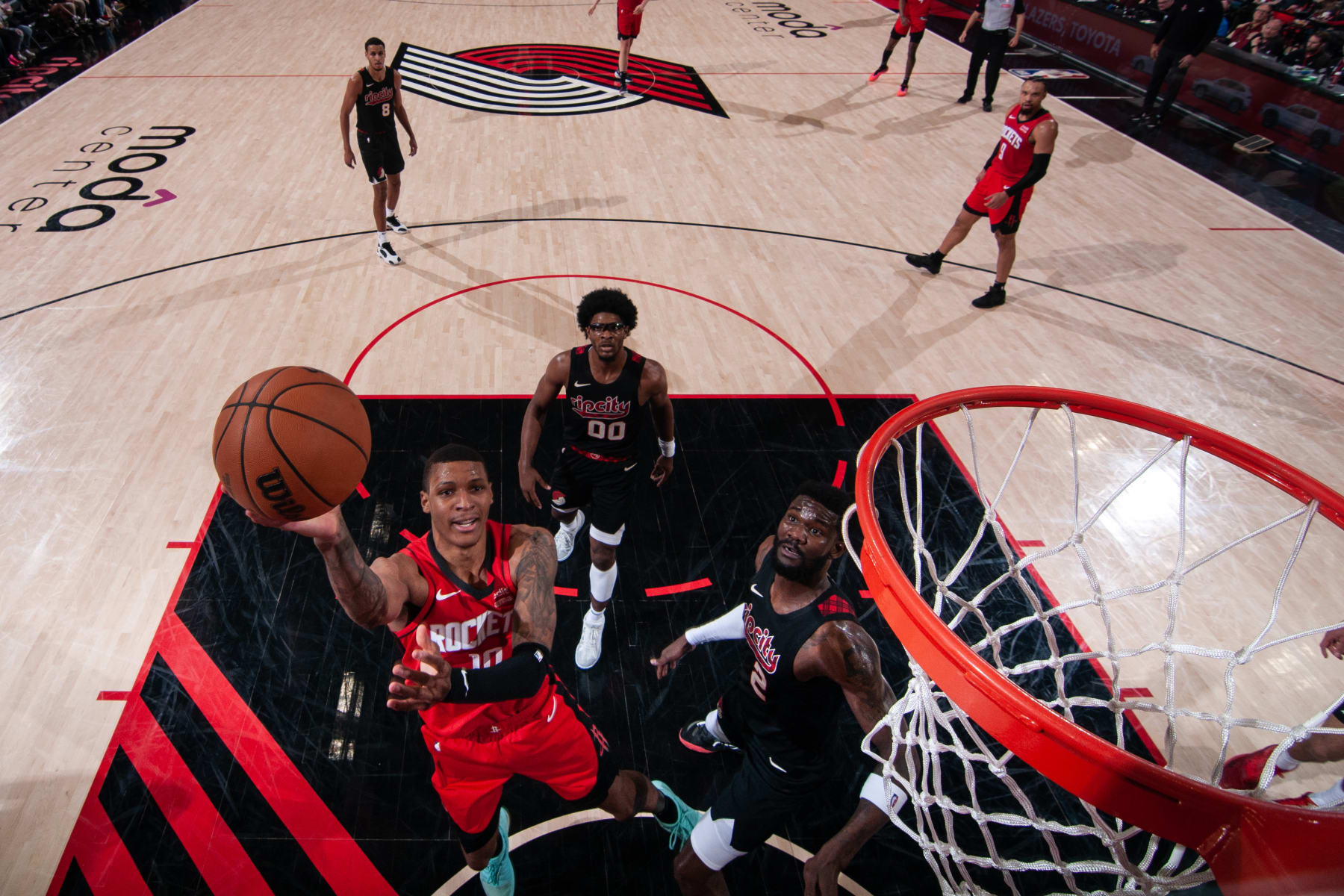PORTLAND, OR - APRIL 12: Jabari Smith Jr. #10 of the Houston Rockets drives to the basket during the game against the Portland Trail Blazers on April 12, 2024 at the Moda Center Arena in Portland, Oregon. NOTE TO USER: User expressly acknowledges and agrees that, by downloading and or using this photograph, user is consenting to the terms and conditions of the Getty Images License Agreement. Mandatory Copyright Notice: Copyright 2024 NBAE (Photo by Cameron Browne/NBAE via Getty Images)