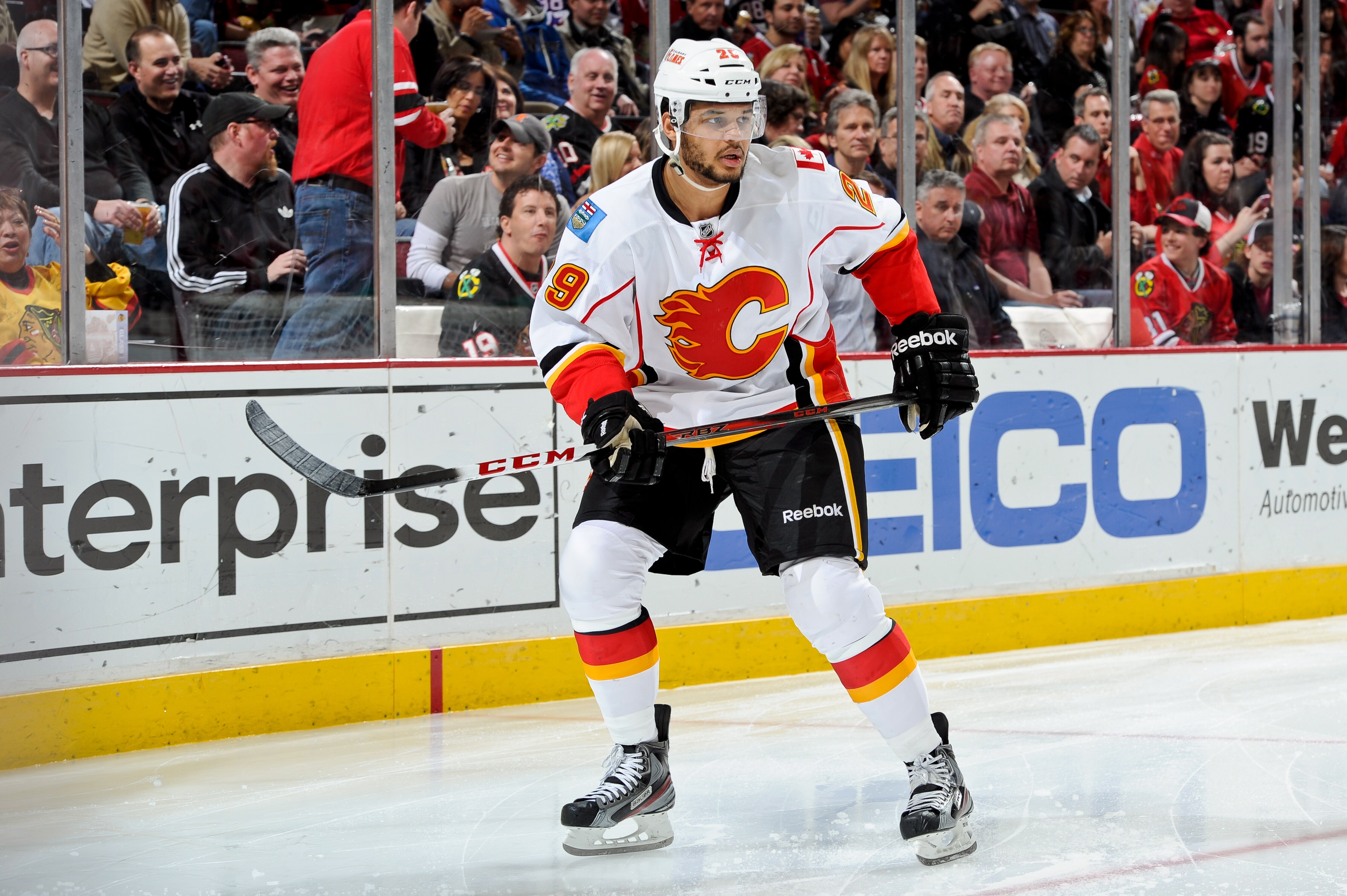 CHICAGO, IL - APRIL 26: Akim Aliu #29 of the Calgary Flames watches for the puck during the NHL game against the Chicago Blackhawks on April 26, 2013 at the United Center in Chicago, Illinois. (Photo by Bill Smith/NHLI via Getty Images)