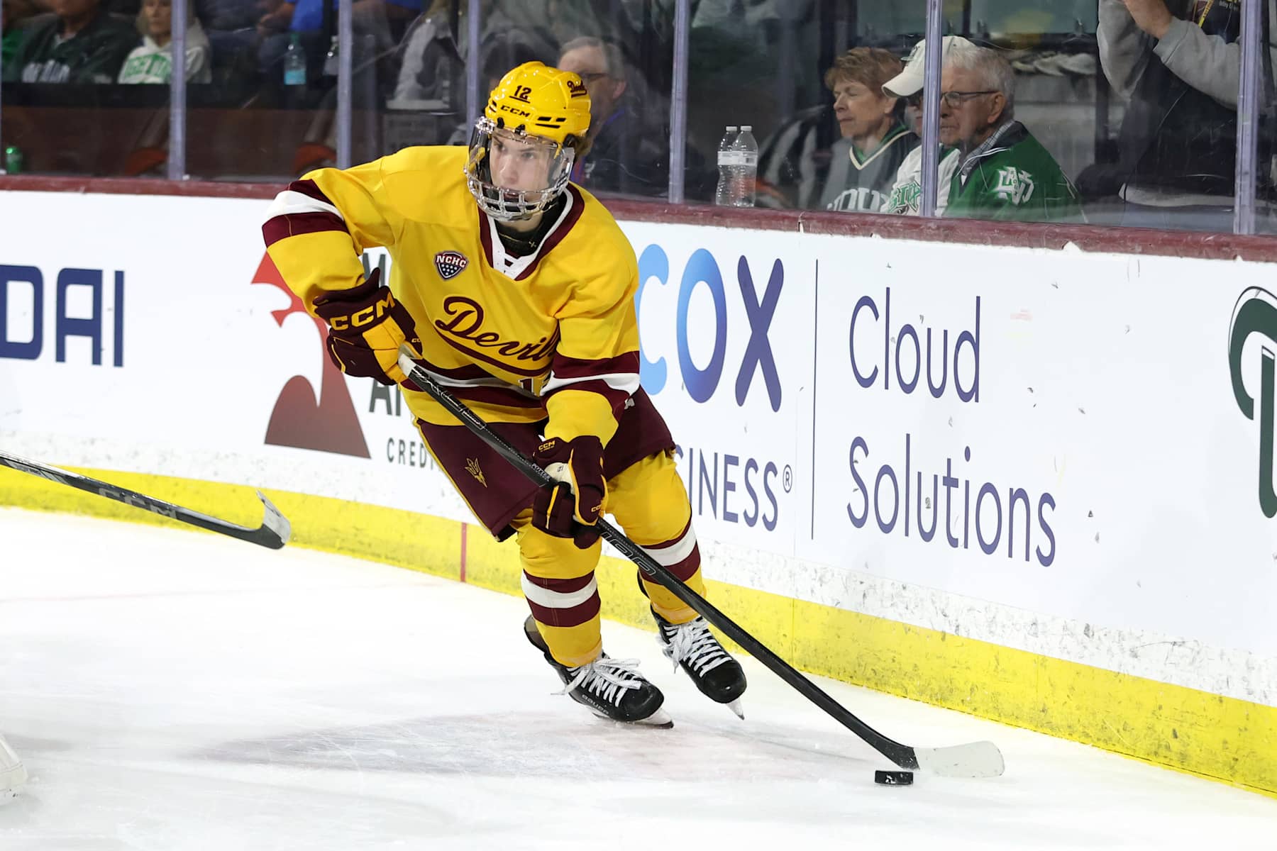 TEMPE, ARIZONA - JANUARY 10: Cullen Potter #12 of Arizona State University Sun Devils skates with the puck against the University of North Dakota Fighting Hawks at Mullett Arena on January 10, 2025 in Tempe, Arizona. (Photo by Zac BonDurant/Getty Images)