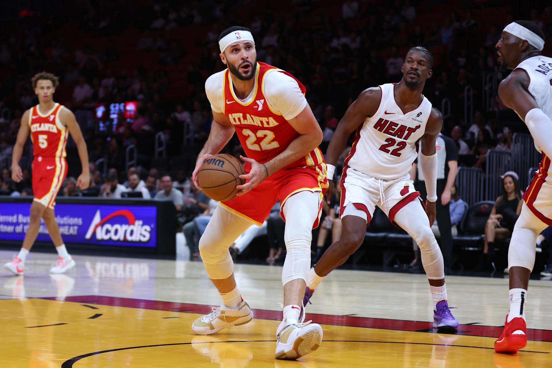 MIAMI, FLORIDA - OCTOBER 16: Larry Nance Jr. #22 of the Atlanta Hawks drives to the basket against the Miami Heat during the second quarter of a preseason game at Kaseya Center on October 16, 2024 in Miami, Florida. NOTE TO USER: User expressly acknowledges and agrees that, by downloading and or using this photograph, User is consenting to the terms and conditions of the Getty Images License Agreement. (Photo by Megan Briggs/Getty Images)