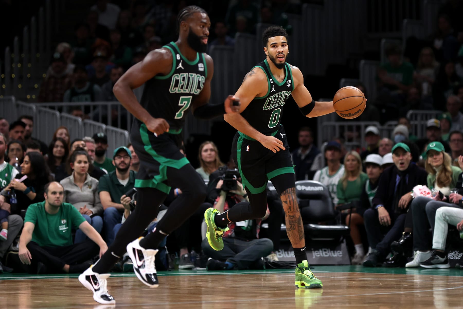 BOSTON, MASSACHUSETTS - OCTOBER 28: Jayson Tatum #0 of the Boston Celtics dribbles downcourt next to Jaylen Brown #7 during the first half of the game against the Cleveland Cavaliers at TD Garden on October 28, 2022 in Boston, Massachusetts. NOTE TO USER: User expressly acknowledges and agrees that, by downloading and or using this photograph, User is consenting to the terms and conditions of the Getty Images License Agreement.  (Photo by Maddie Meyer/Getty Images)