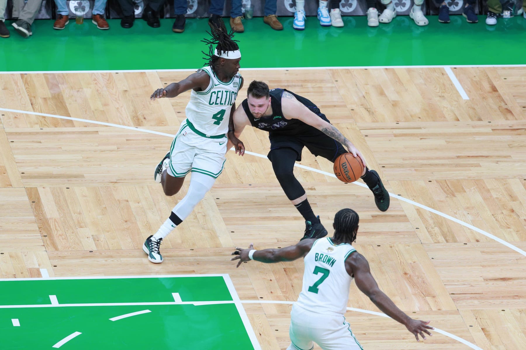 Jrue Holiday, Luka DonÄiÄ and Jaylen Brown