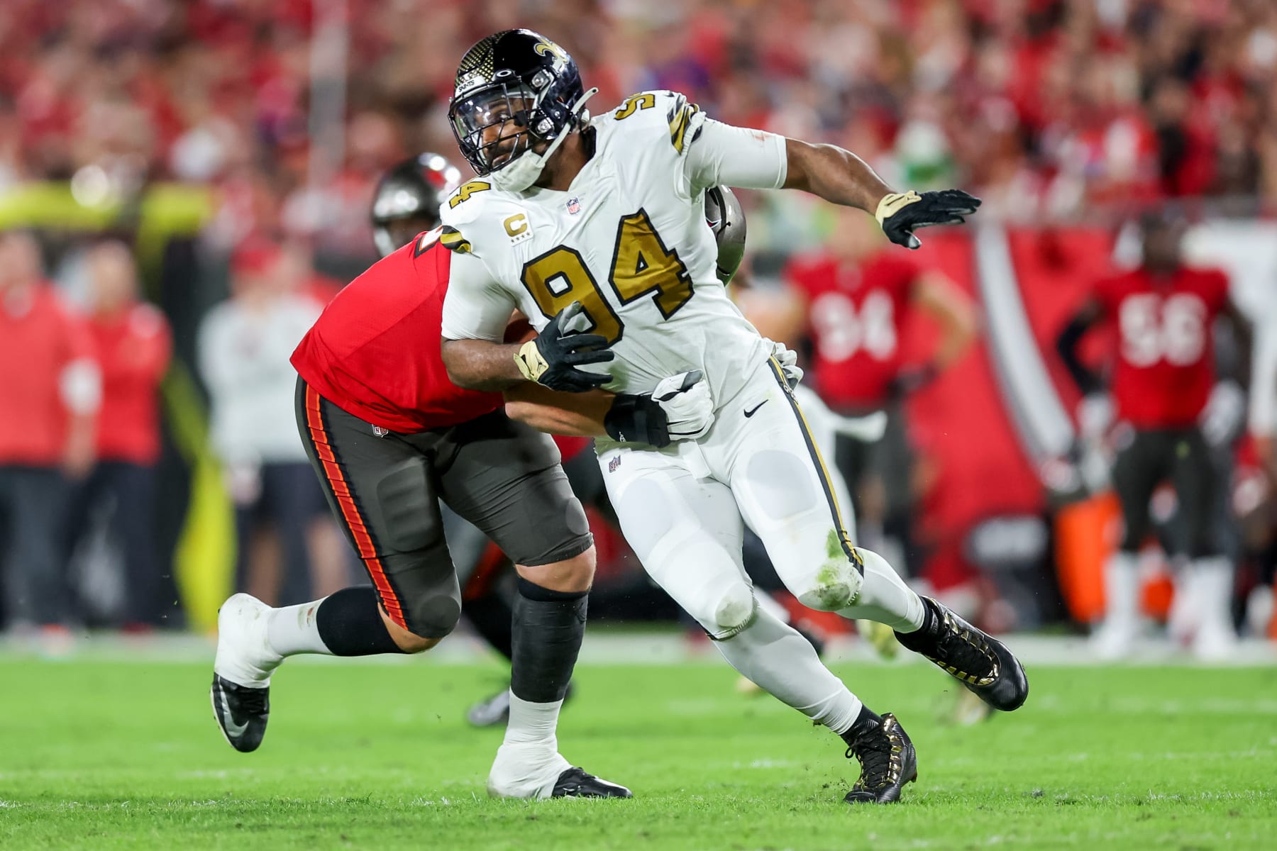 TAMPA, FLORIDA - DECEMBER 5: Cameron Jordan #94 of the New Orleans Saints defends against the Tampa Bay Buccaneers at Raymond James Stadium on December 5, 2022 in Tampa, Florida. (Photo by Mike Carlson/Getty Images)