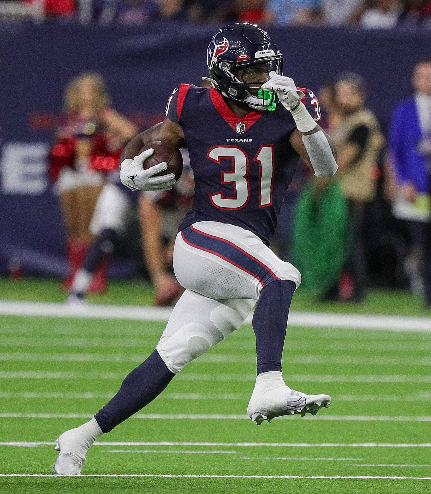 HOUSTON, TEXAS - AUGUST 13: Dameon Pierce #31 of the Houston Texans rushes in the first half against the New Orleans Saints in a preseason game at NRG Stadium on August 13, 2022 in Houston, Texas. (Photo by Bob Levey/Getty Images)