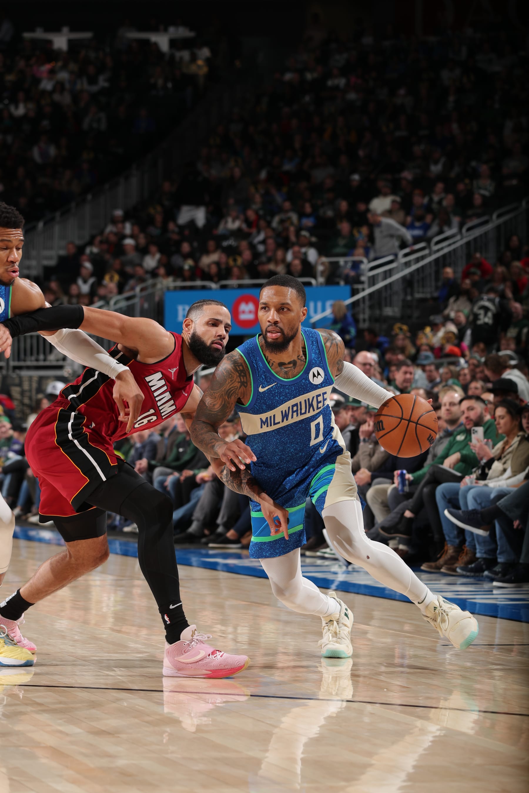 MILWAUKEE, WI - FEBRUARY 13: Damian Lillard #0 of the Milwaukee Bucks dribbles the ball during the game against the Miami Heat on February 13, 2024 at the Fiserv Forum Center in Milwaukee, Wisconsin. NOTE TO USER: User expressly acknowledges and agrees that, by downloading and or using this Photograph, user is consenting to the terms and conditions of the Getty Images License Agreement. Mandatory Copyright Notice: Copyright 2024 NBAE (Photo by Gary Dineen/NBAE via Getty Images).