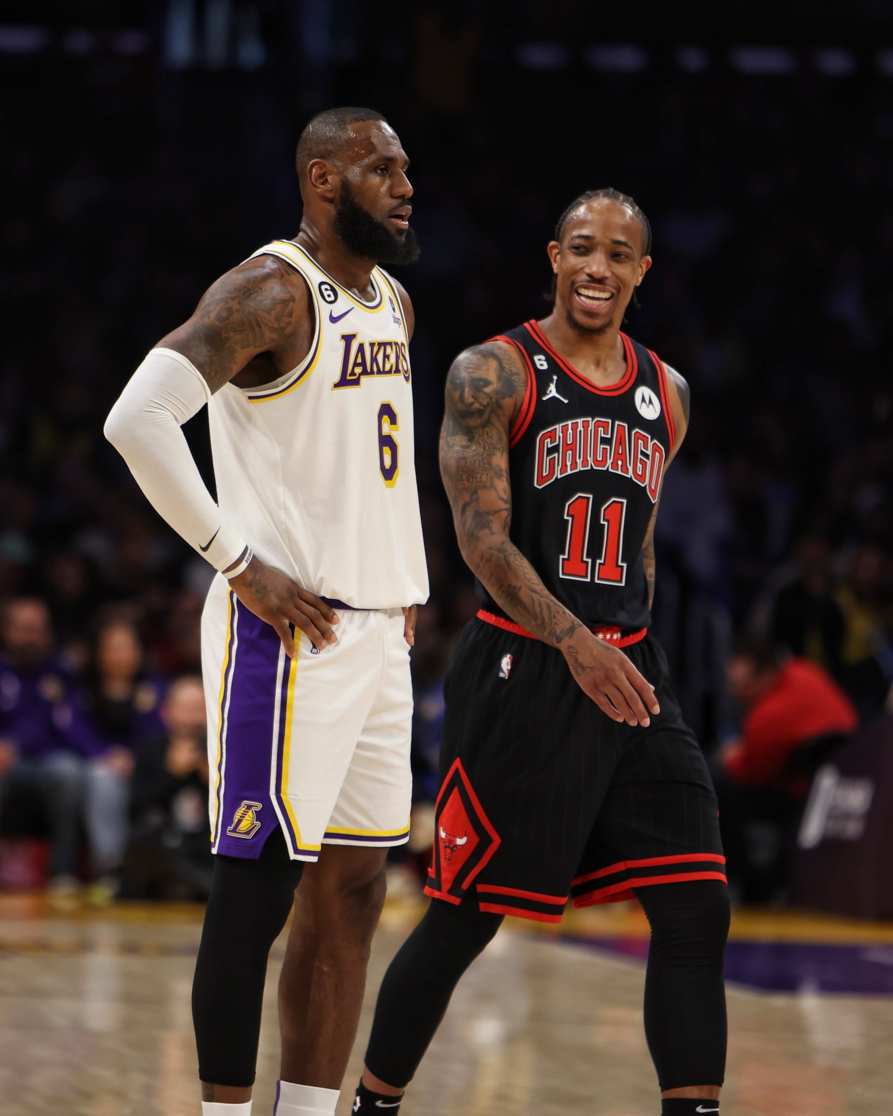 LOS ANGELES - MARCH 26: LeBron James #6 of the Los Angeles Lakers and DeMar DeRozan #11 of the Chicago Bulls look on during the game on March 26, 2023 at Cryto.com Arena in Los Angeles, California. NOTE TO USER: User expressly acknowledges and agrees that, by downloading and or using this Photograph, User is consenting to the terms and conditions of the Getty Images License Agreement. Mandatory Copyright Notice: Copyright 2023 NBAE (Photo by Jim Poorten/NBAE via Getty Images)