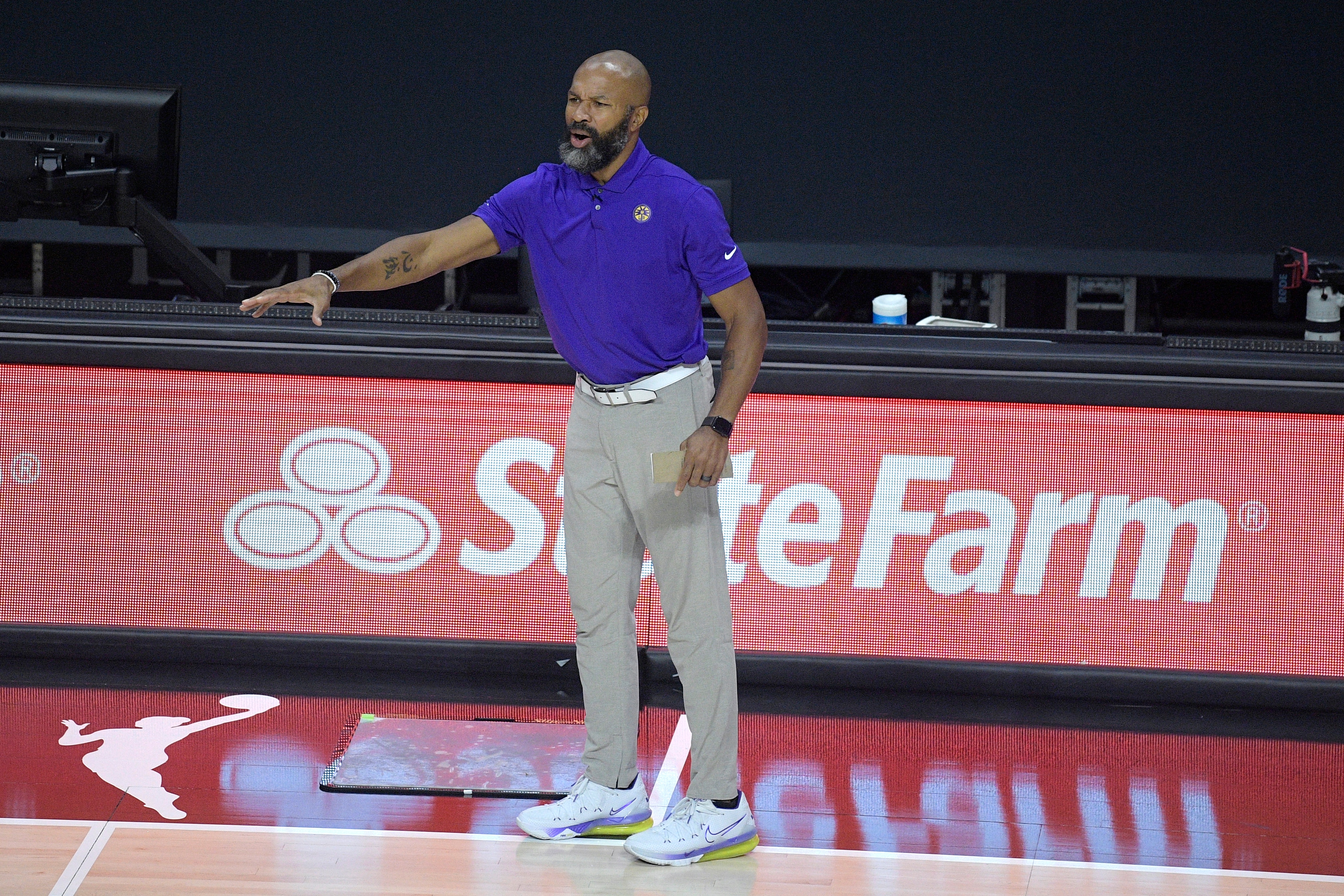 Los Angeles Sparks head coach Derek Fisher calls out instructions from the sideline during the first half of a WNBA basketball game against the Indiana Fever, Saturday, Aug. 15, 2020, in Bradenton, Fla. (AP Photo/Phelan M. Ebenhack)
