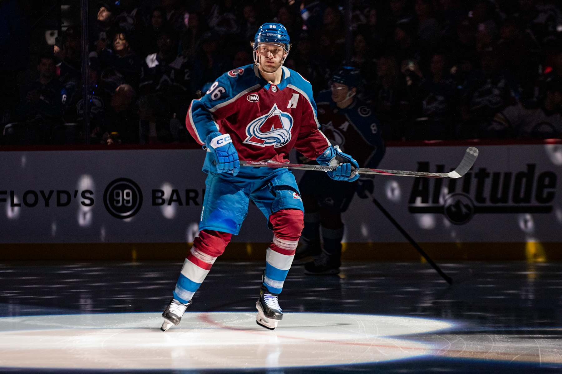 DENVER, COLORADO - JANUARY 02: Mikko Rantanen #96 of the Colorado Avalanche skates in the spotlight ahead of the game against the Buffalo Sabres at Ball Arena on January 02, 2025 in Denver, Colorado. (Photo by Ashley Potts/NHLI via Getty Images)