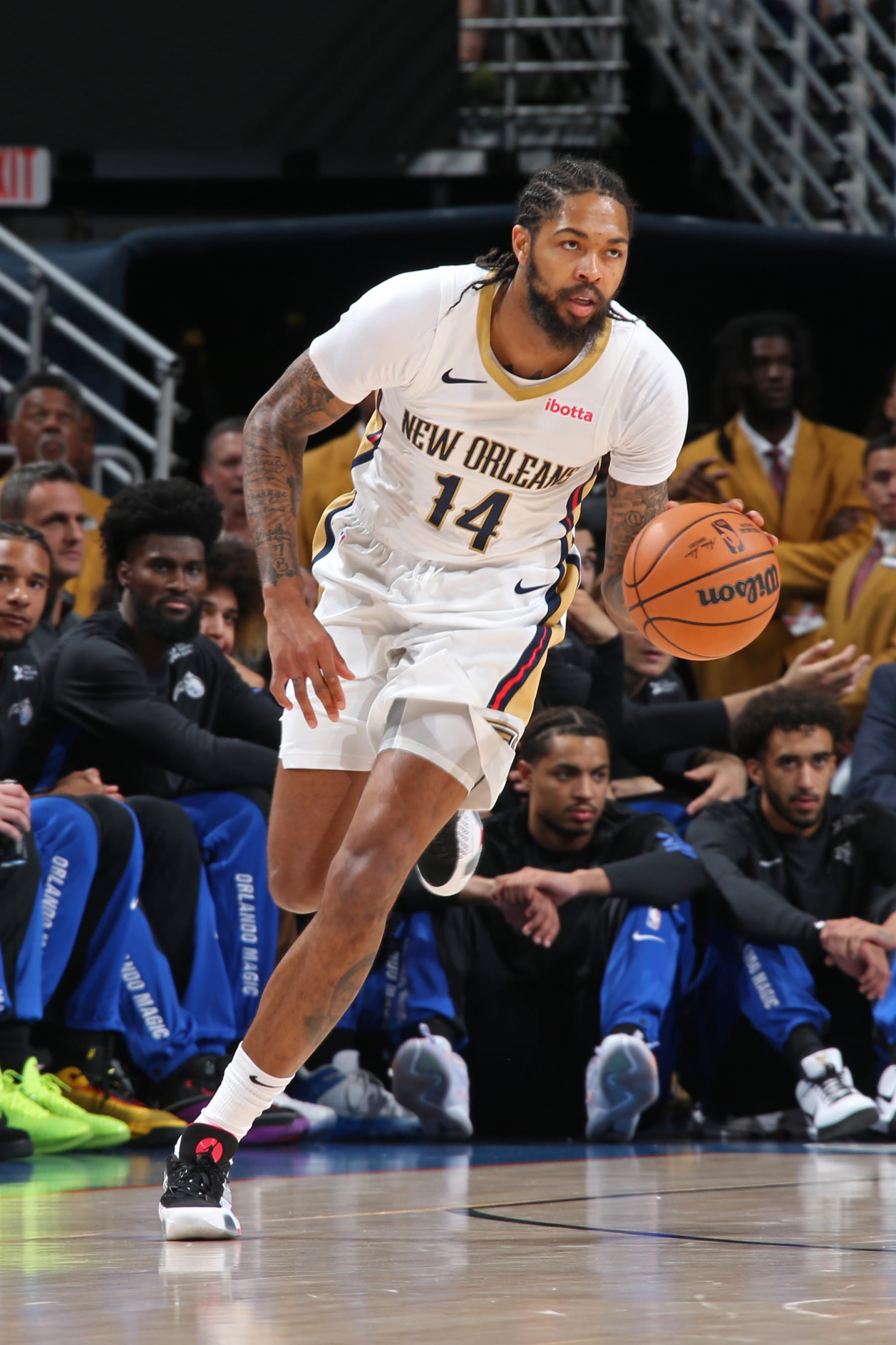 NEW ORLEANS, LA - OCTOBER 10: Brandon Ingram #14 of the New Orleans Pelicans brings the ball up court against the Orlando Magic on October 10, 2023 at the Smoothie King Center in New Orleans, Louisiana. NOTE TO USER: User expressly acknowledges and agrees that, by downloading and or using this Photograph, user is consenting to the terms and conditions of the Getty Images License Agreement. Mandatory Copyright Notice: Copyright 2023 NBAE (Photo by Layne Murdoch Jr./NBAE via Getty Images)