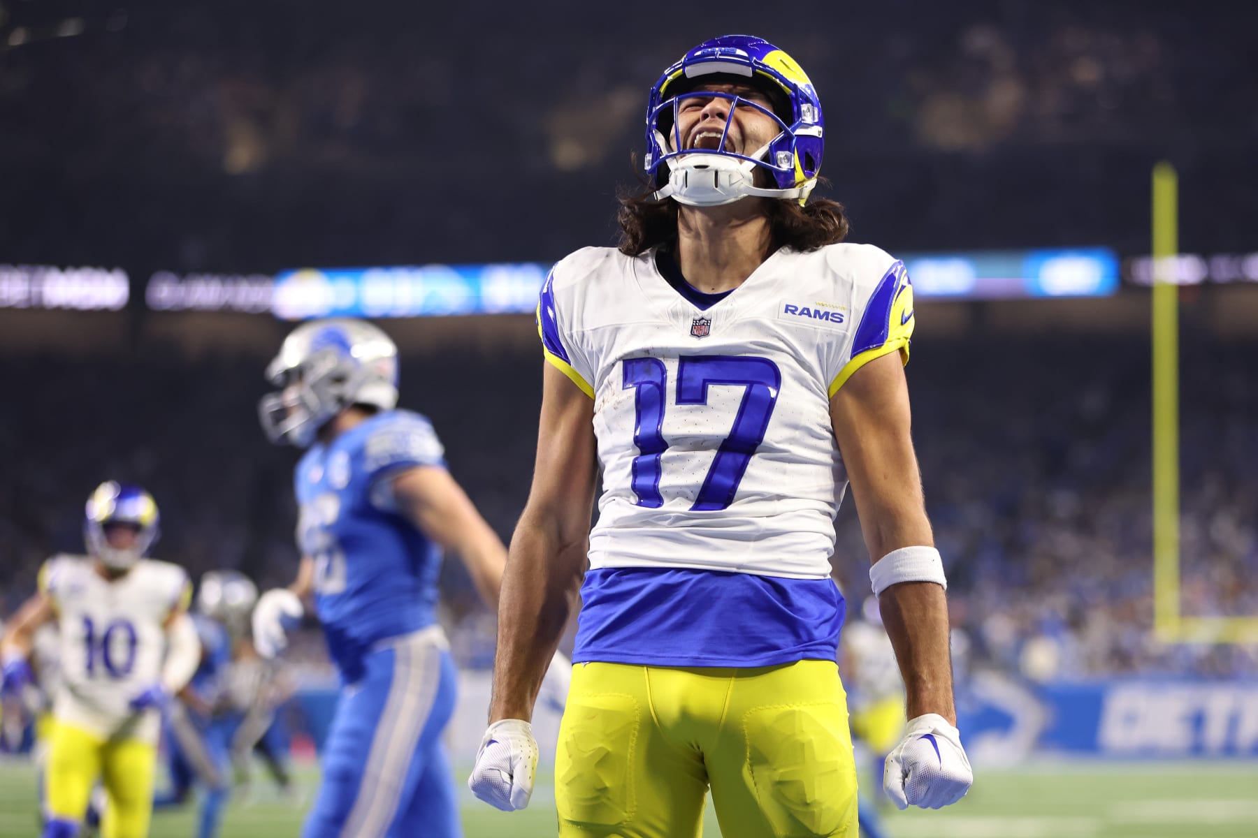 DETROIT, MICHIGAN - JANUARY 14: Puka Nacua #17 of the Los Angeles Rams reacts to a touchdown while playing the Detroit Lions during a NFC Wild Card Playoff game at Ford Field on January 14, 2024 in Detroit, Michigan. (Photo by Gregory Shamus/Getty Images)